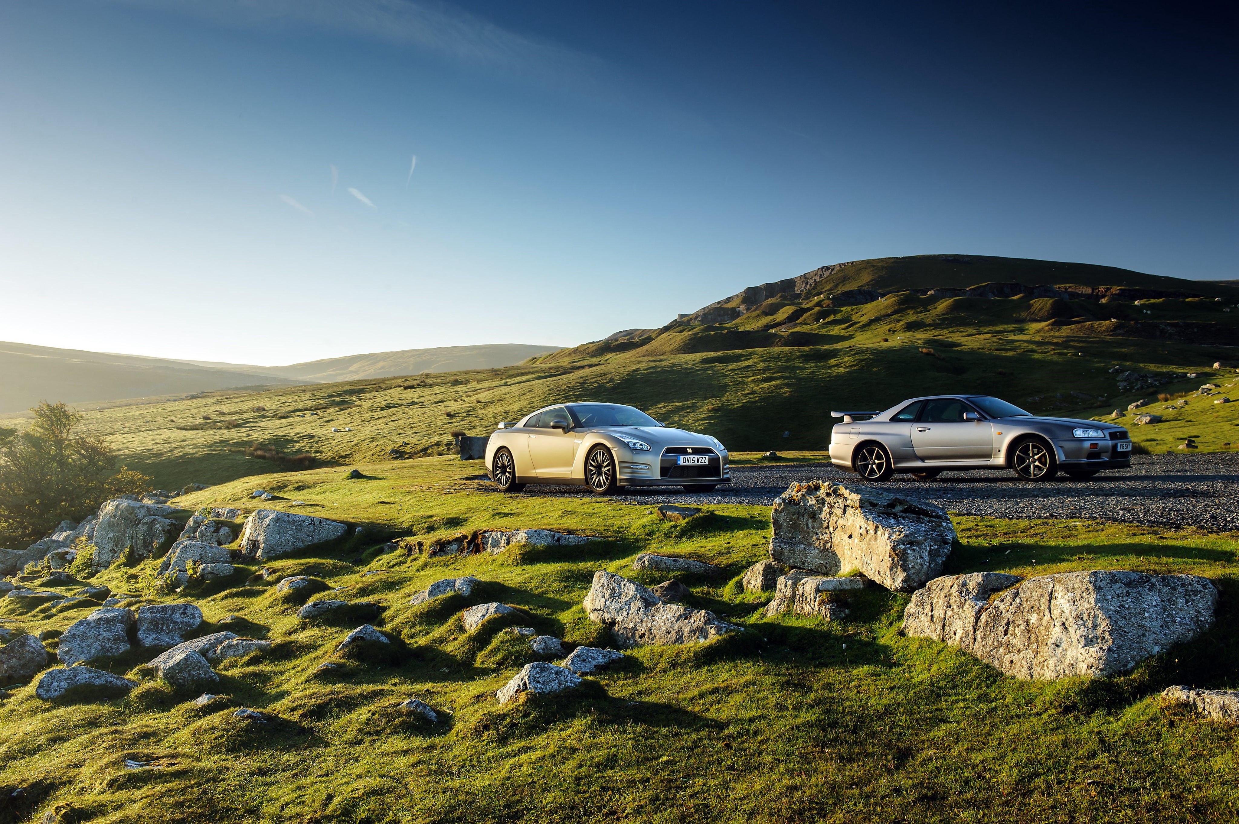 Nissan GT-R R35 and R34 in Grasslands HD Wallpaper