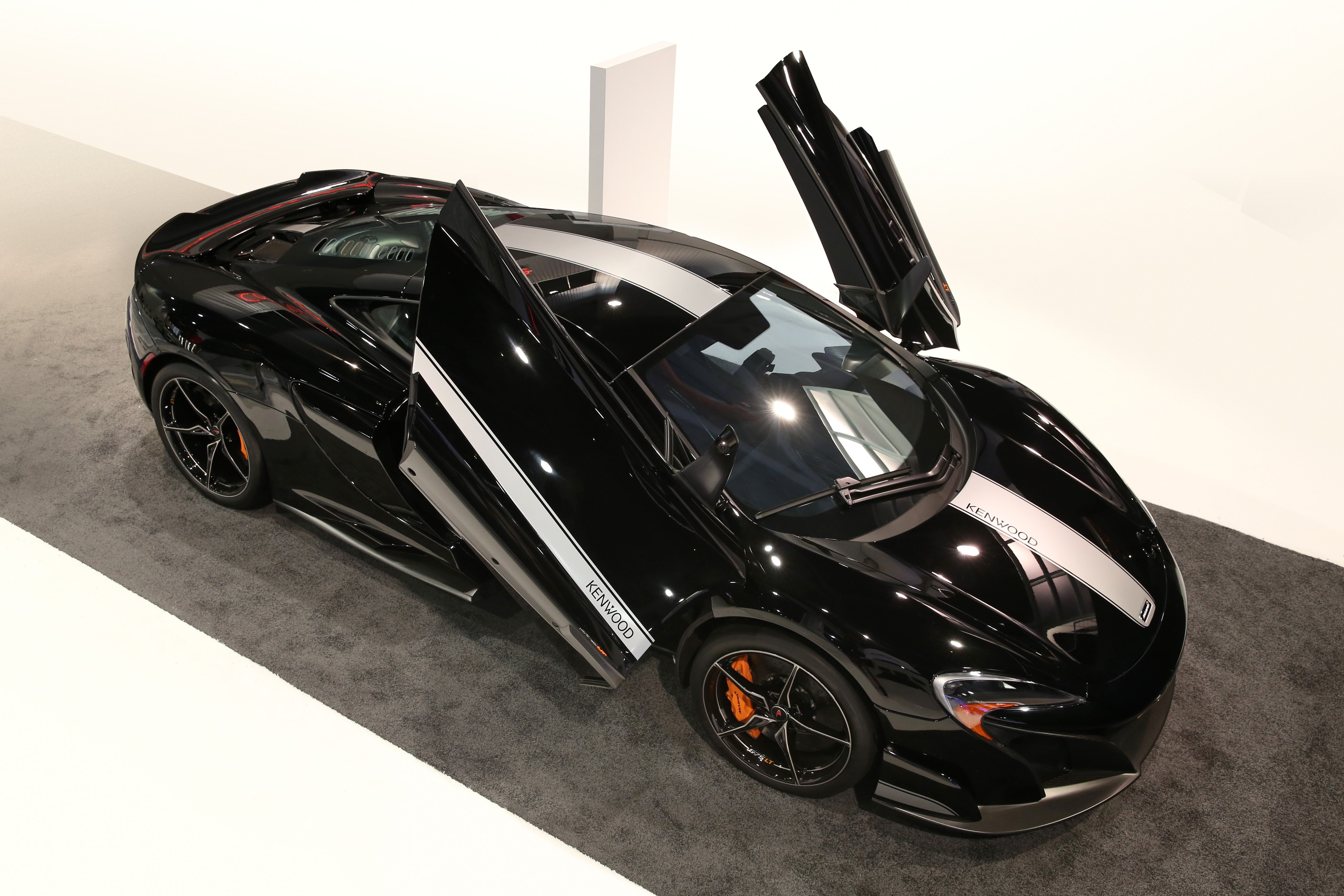Black McLaren 675LT JVC-Kenwood concept with opened doors HD Wallpaper