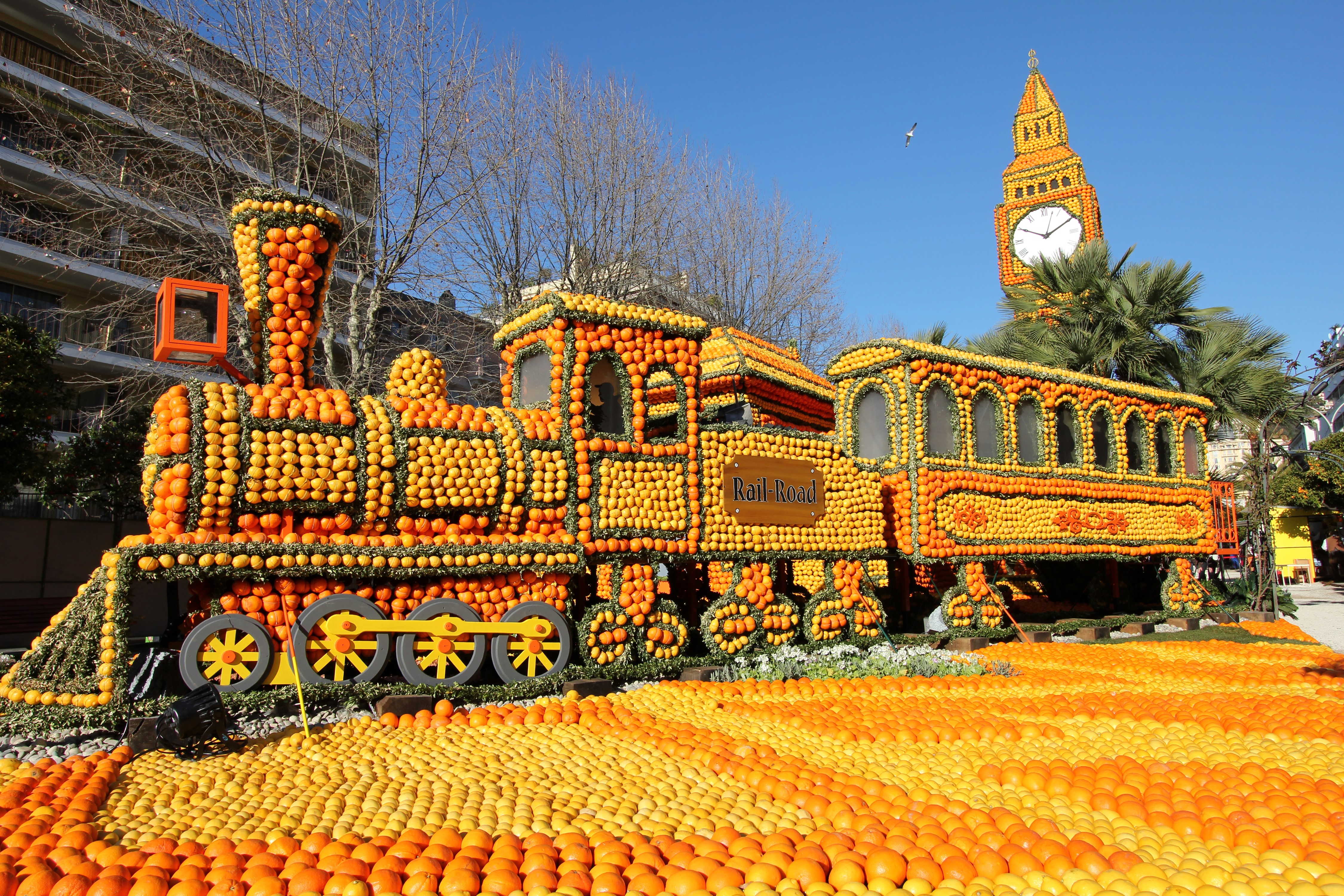 Train float made of citrus fruits at Lemon Festival Menton, France HD Wallpaper