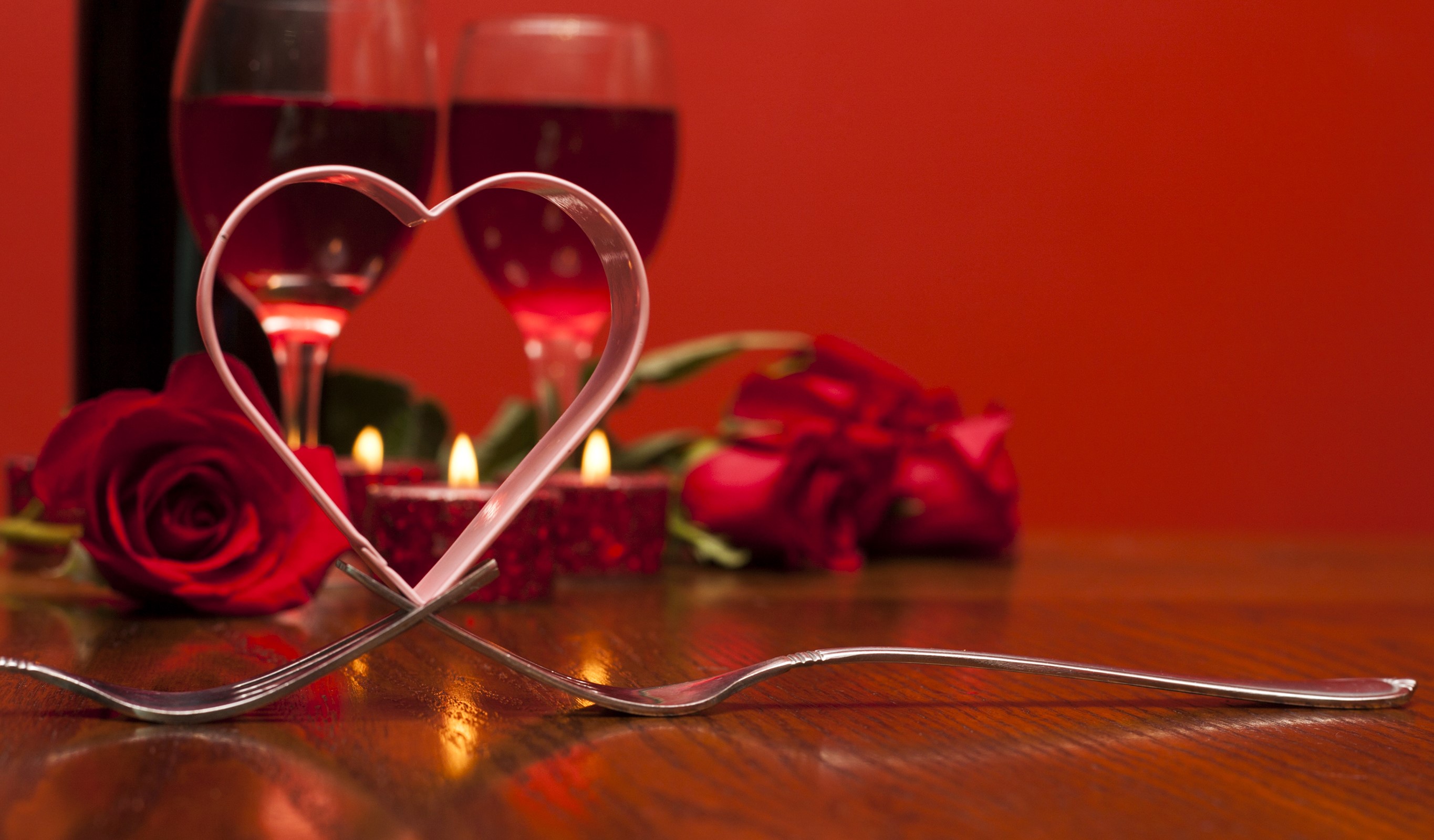 Valentine's Day romantic dinner setting with wine and roses HD Wallpaper