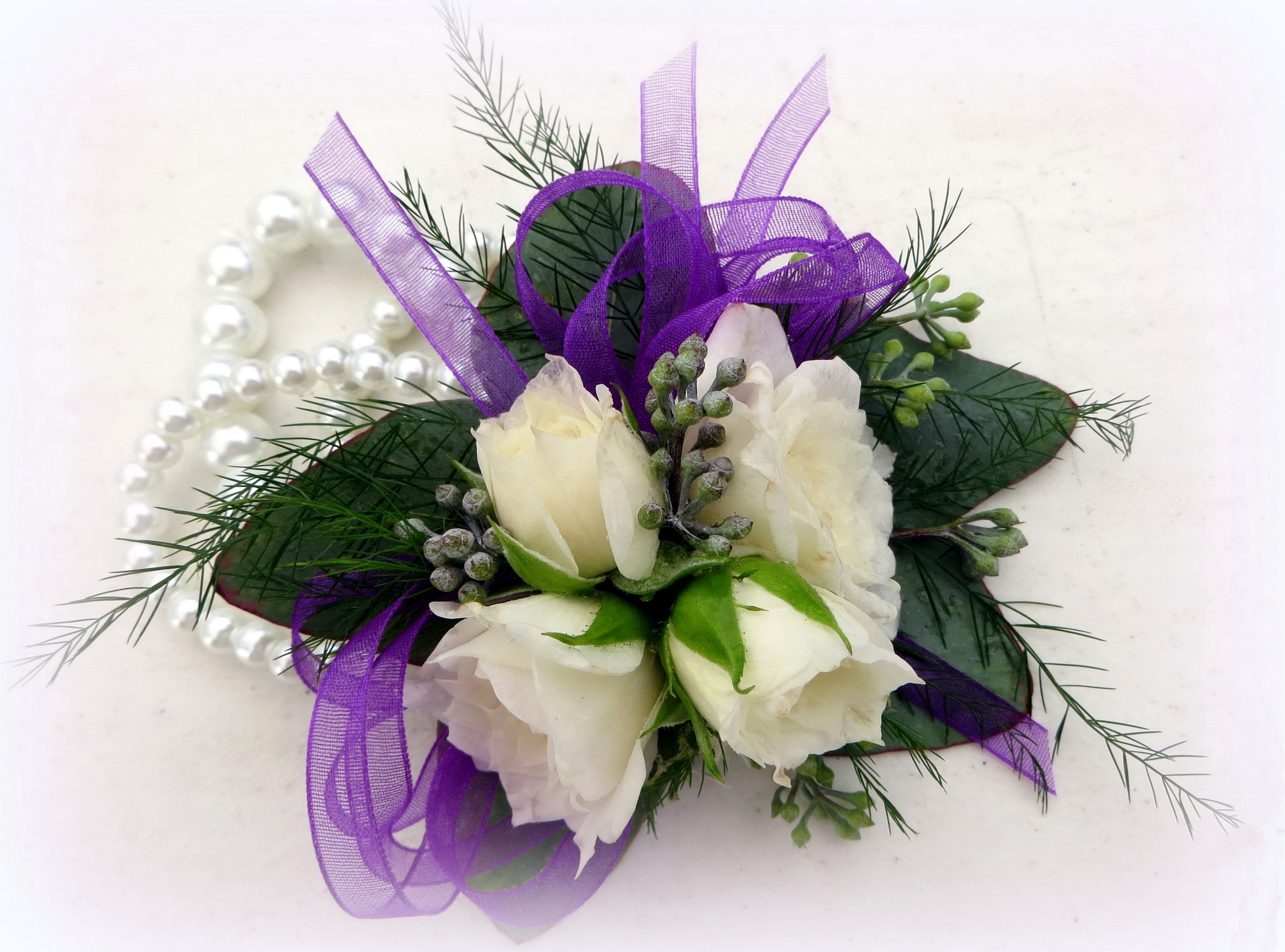 White roses corsage with purple ribbon and pearls HD Wallpaper