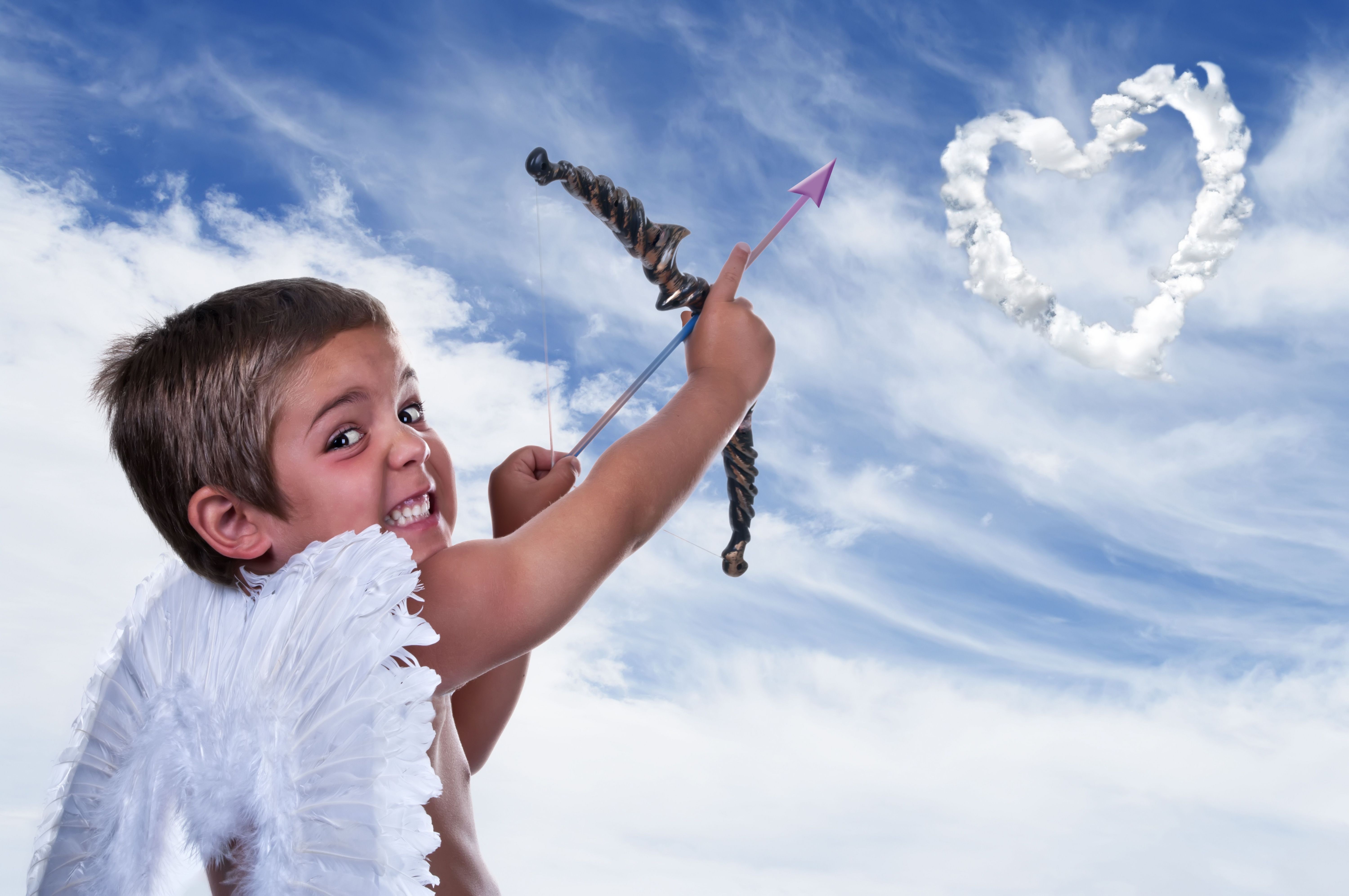 Cupid aiming bow at heart cloud HD Wallpaper
