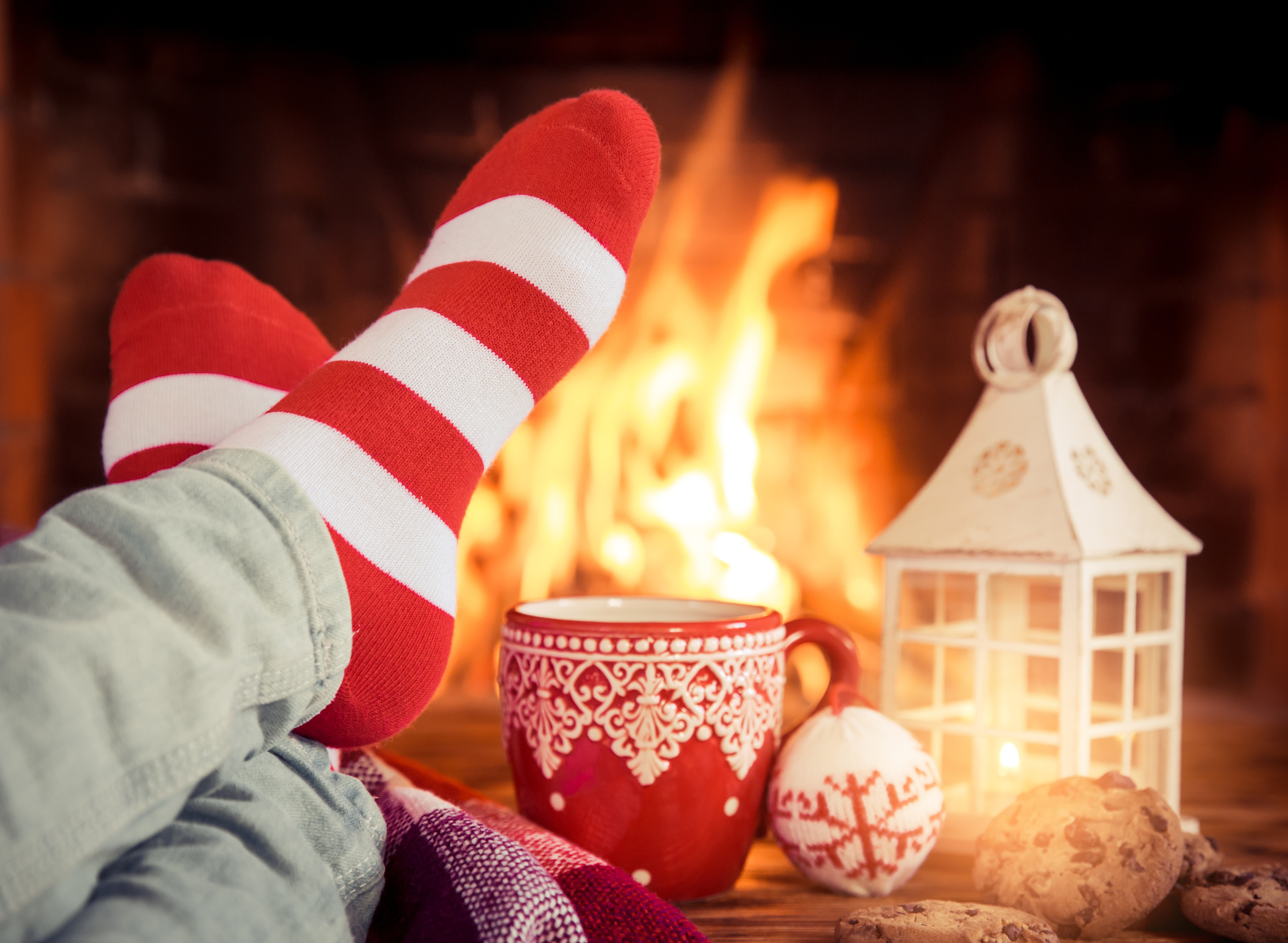 Christmas socks and mug by fireplace HD Wallpaper