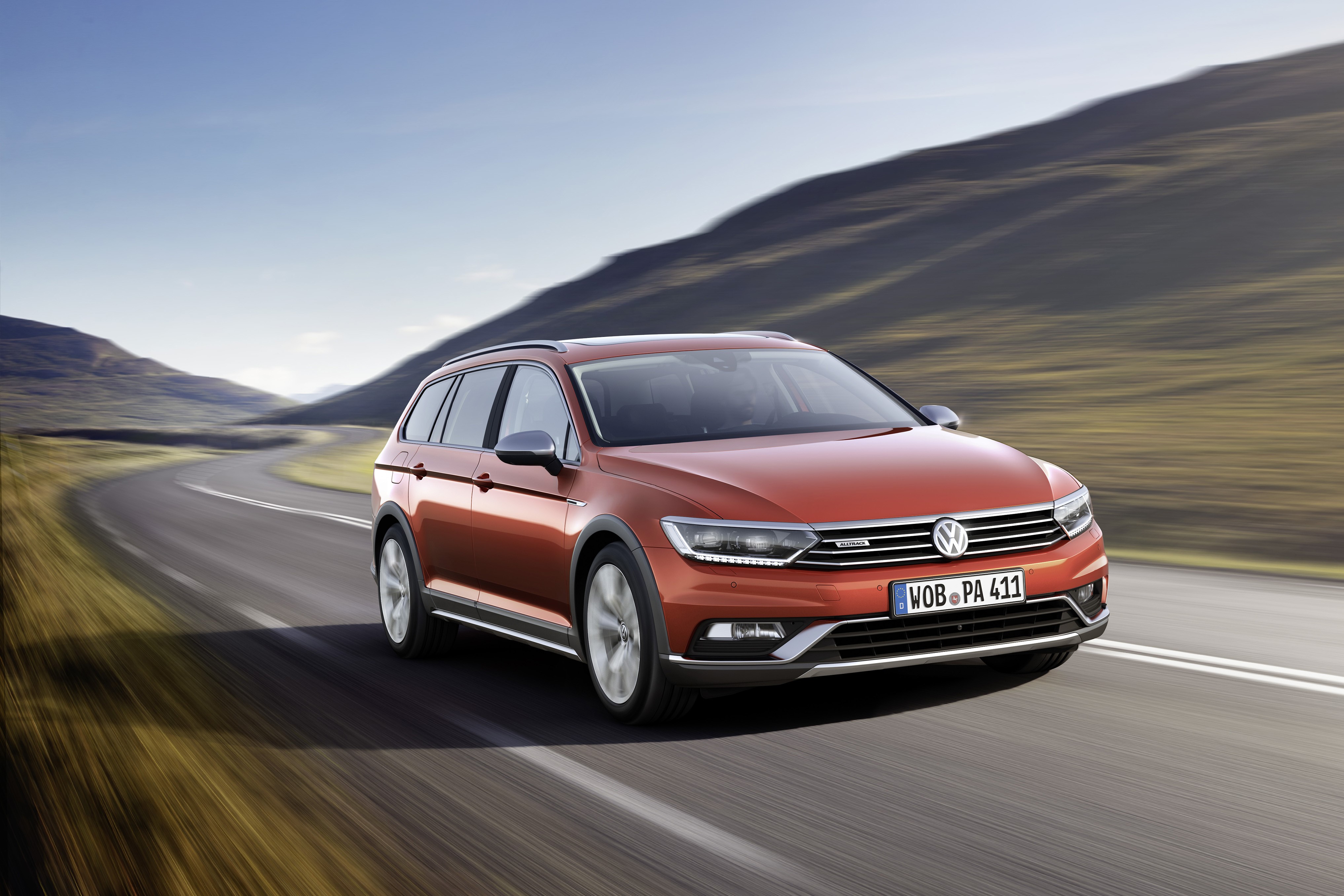 2015 Volkswagen Passat Alltrack B8 on a road HD Wallpaper
