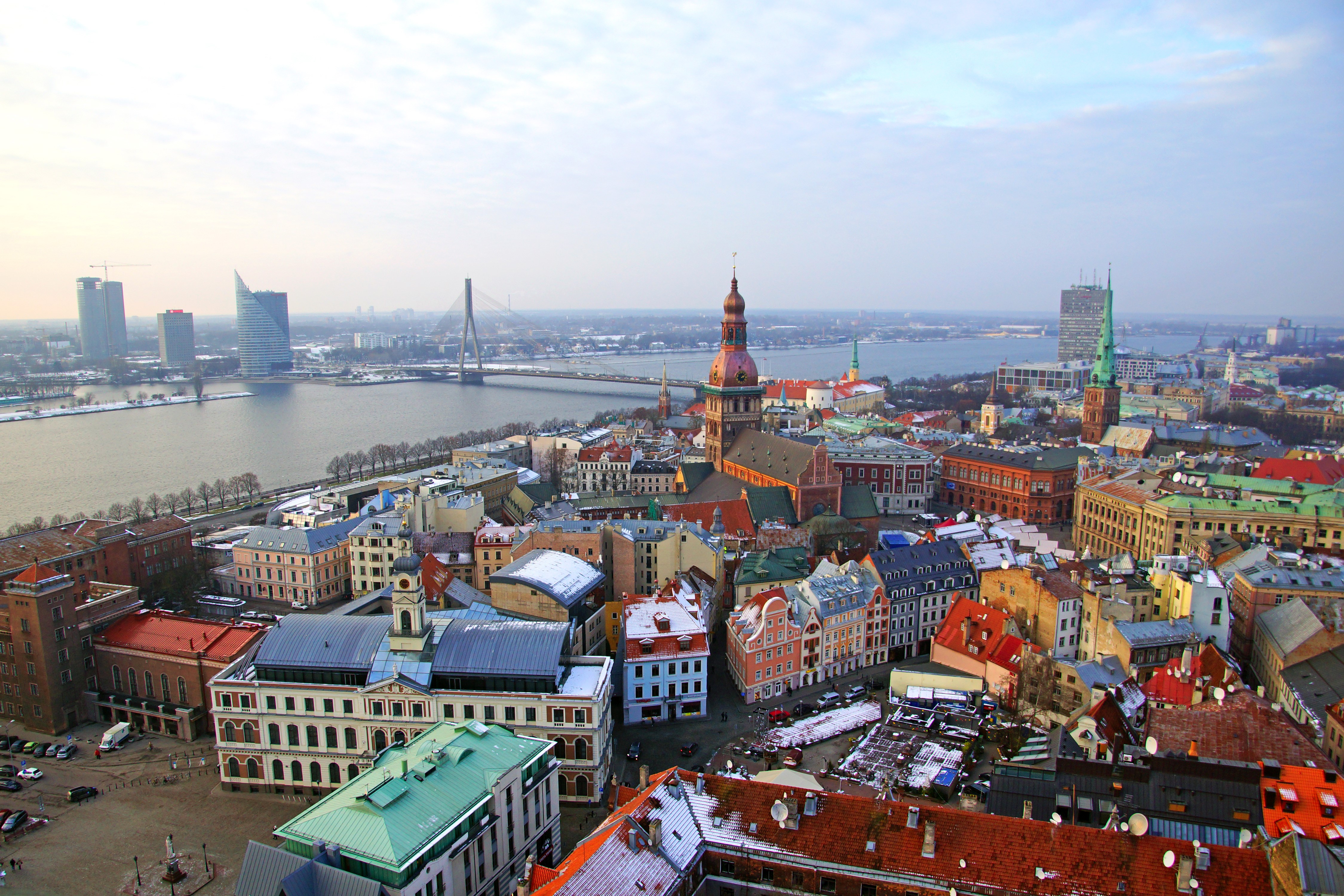 Riga, Latvia: Cityscape with River and Bridges HD Wallpaper