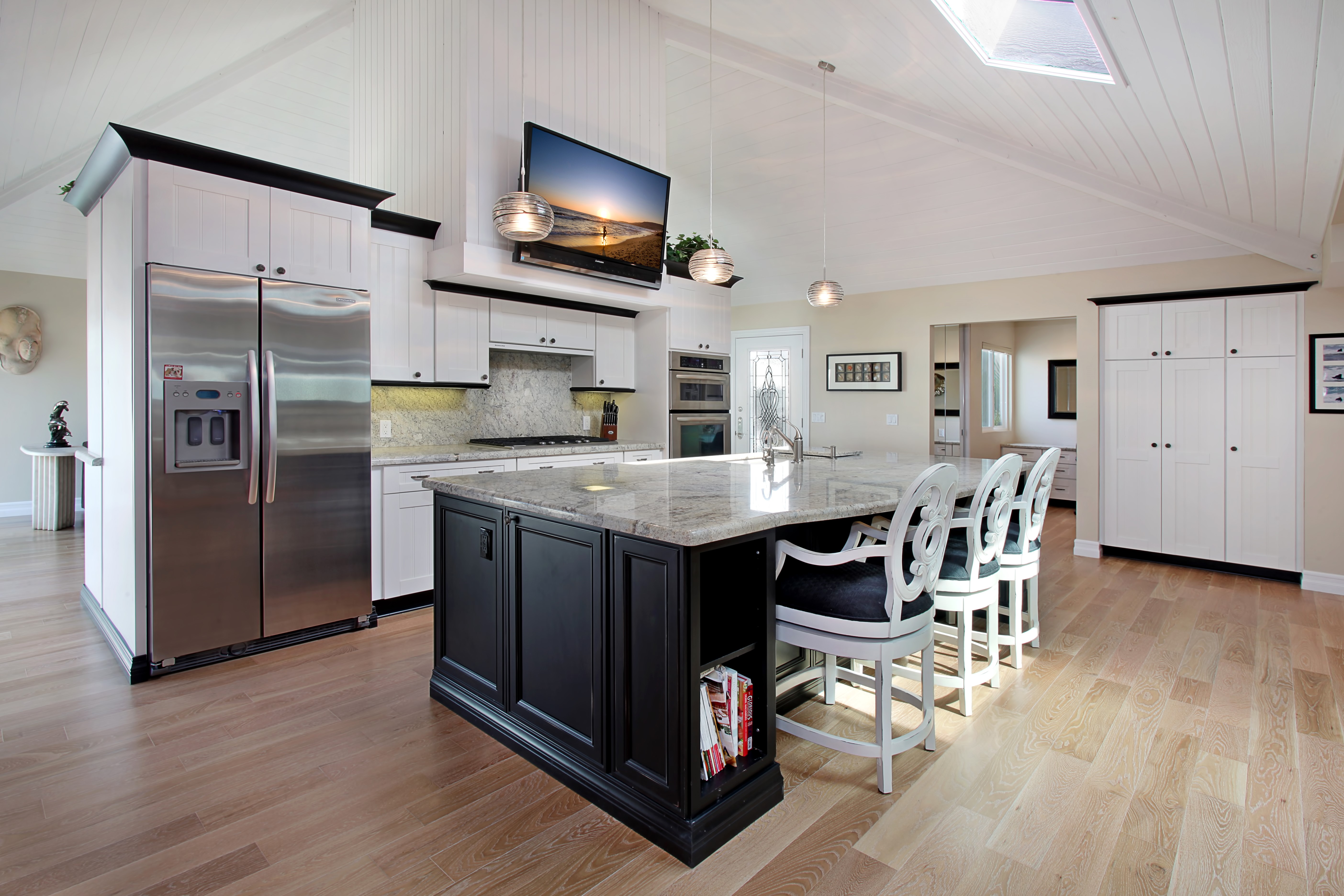 Modern Kitchen with Island and Stainless Steel Appliances HD Wallpaper