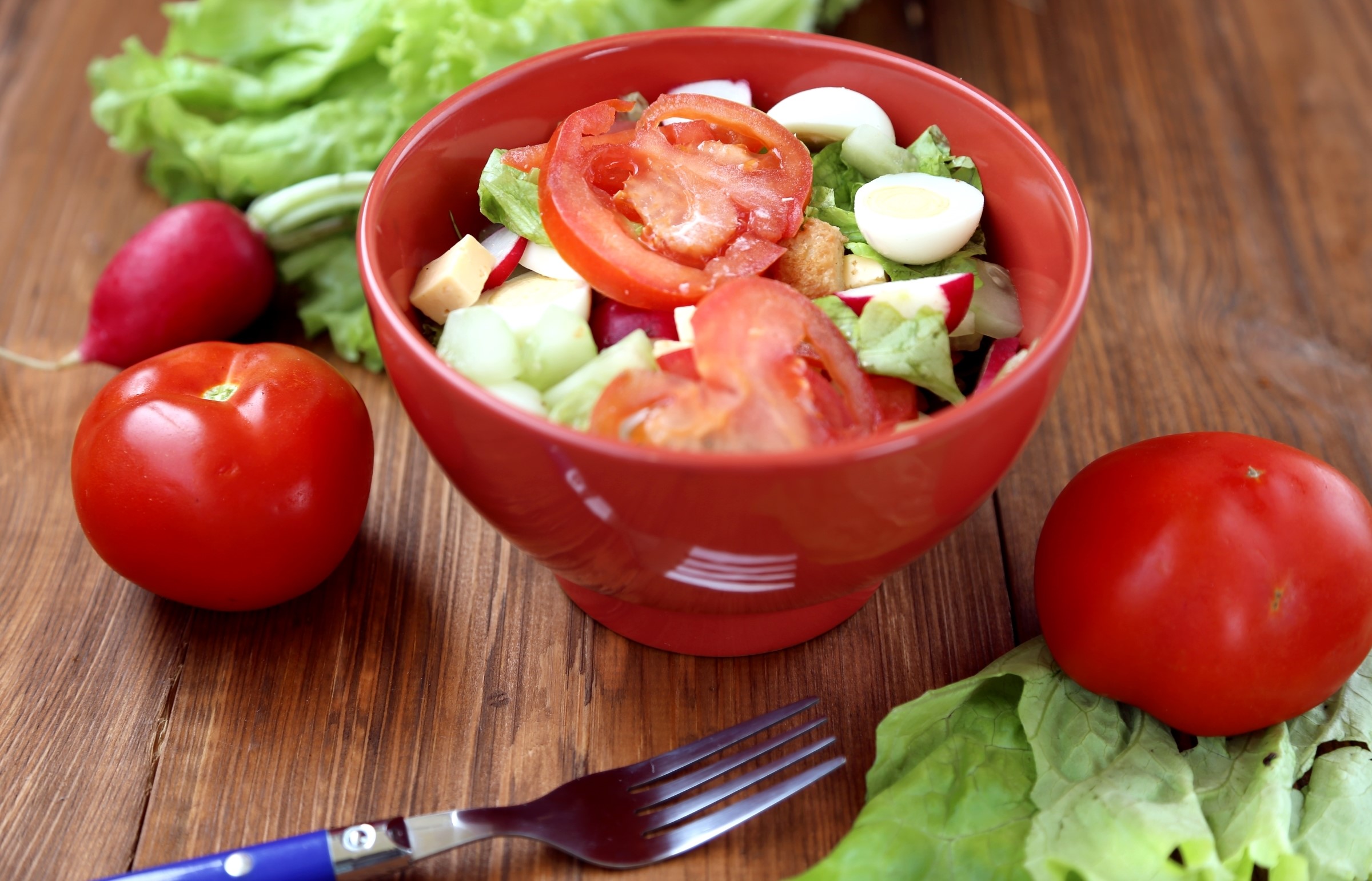 Salad with tomatoes, cucumbers, radishes, and eggs in a red bowl HD Wallpaper