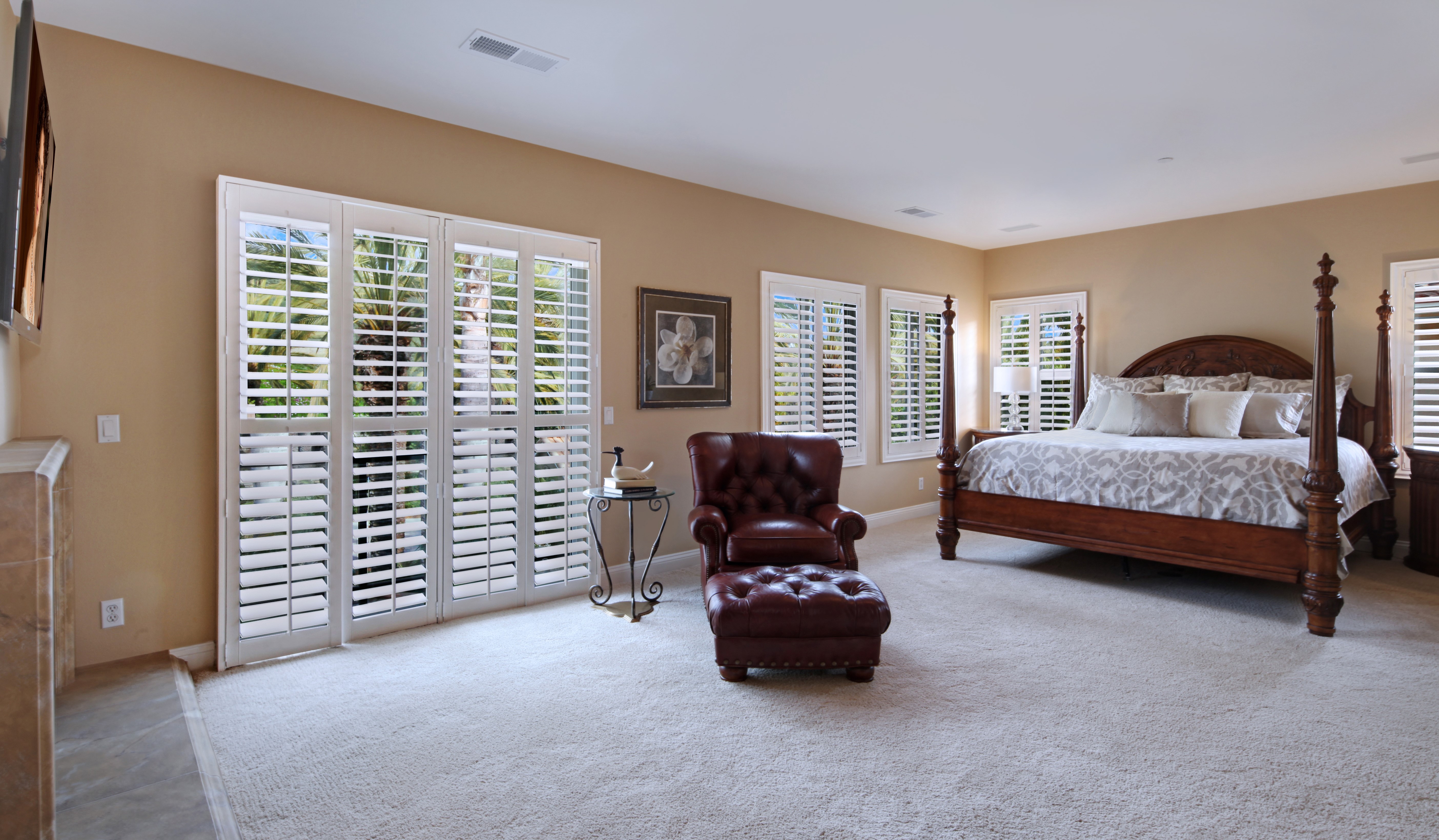 Bedroom with four-poster bed and armchair HD Wallpaper