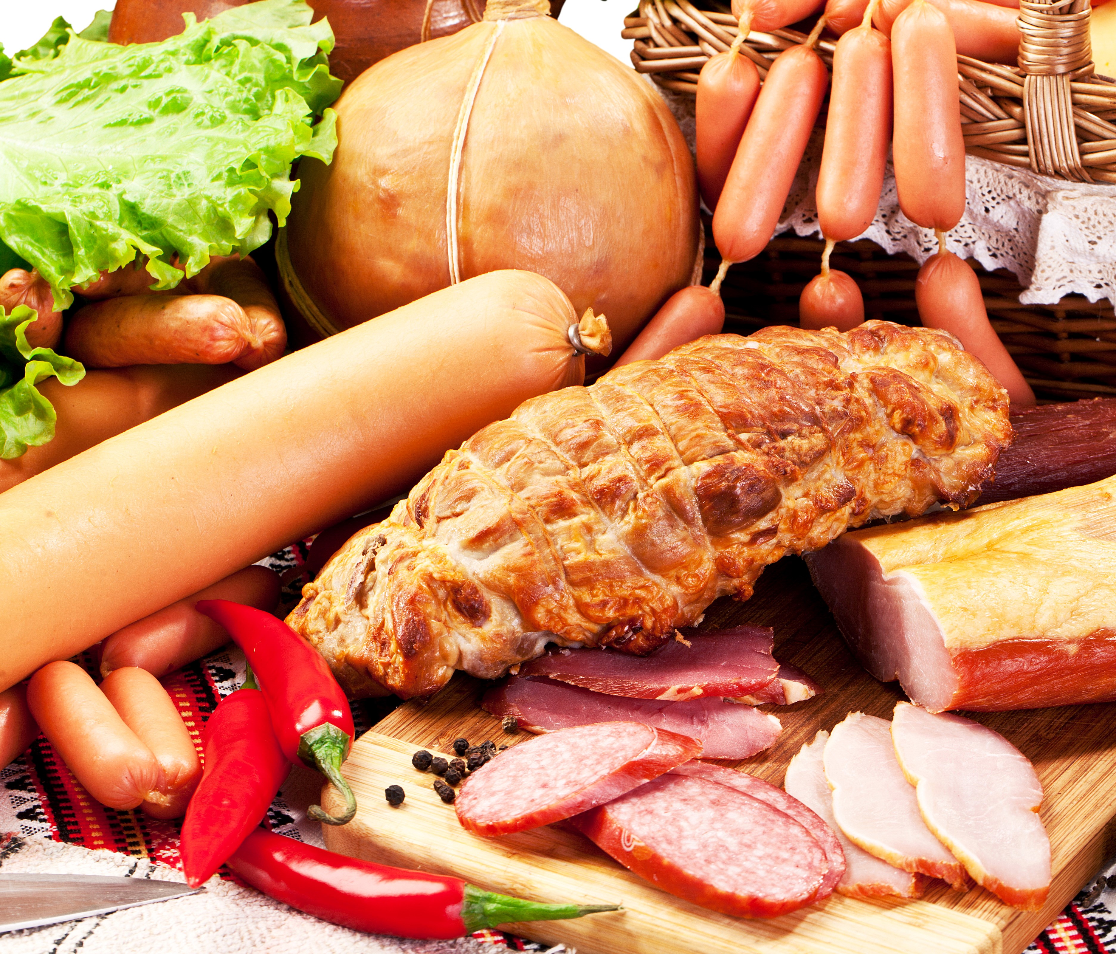Assortment of meat products including sausages, ham, and roasted meat HD Wallpaper
