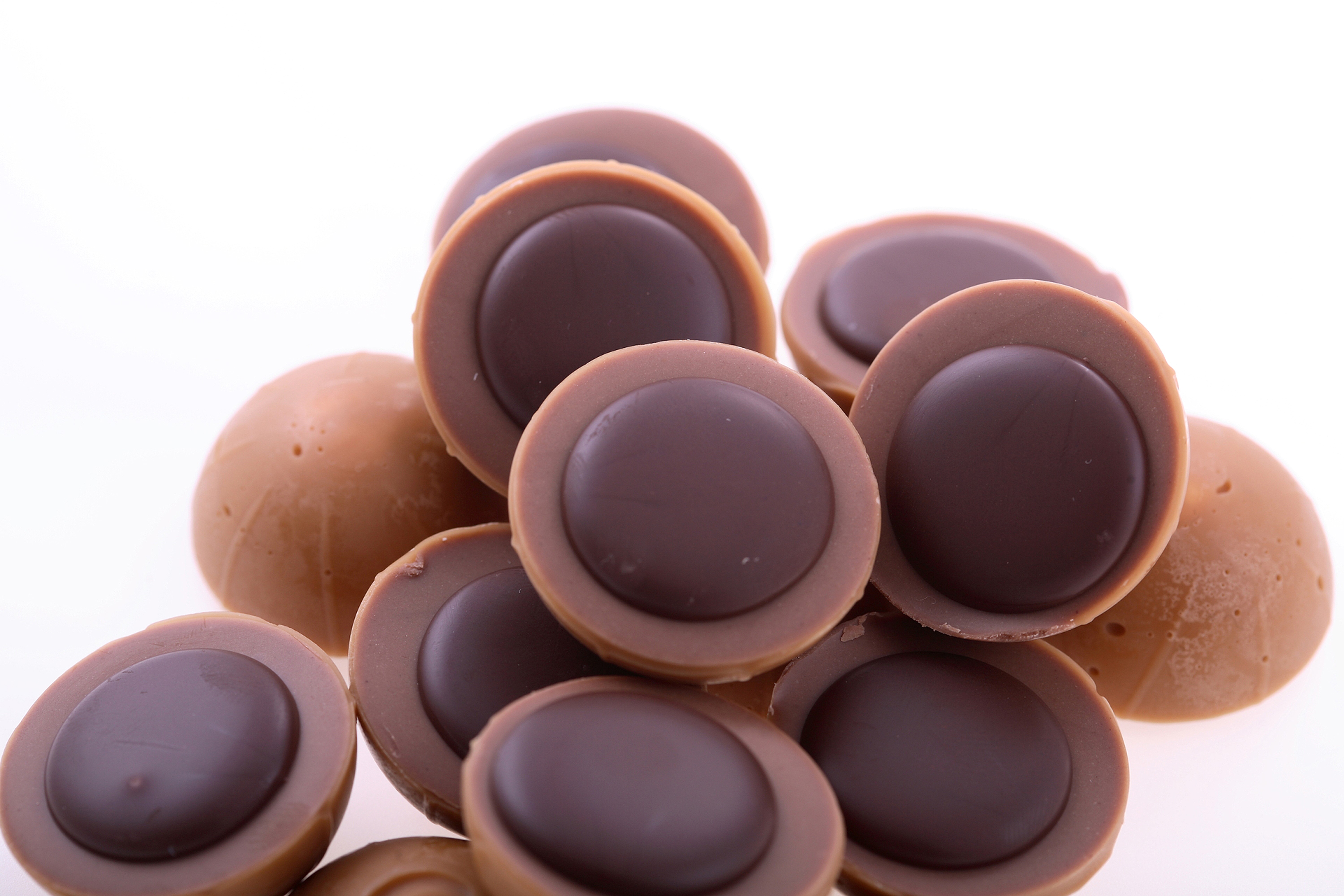Pile of Chocolate Candies HD Wallpaper