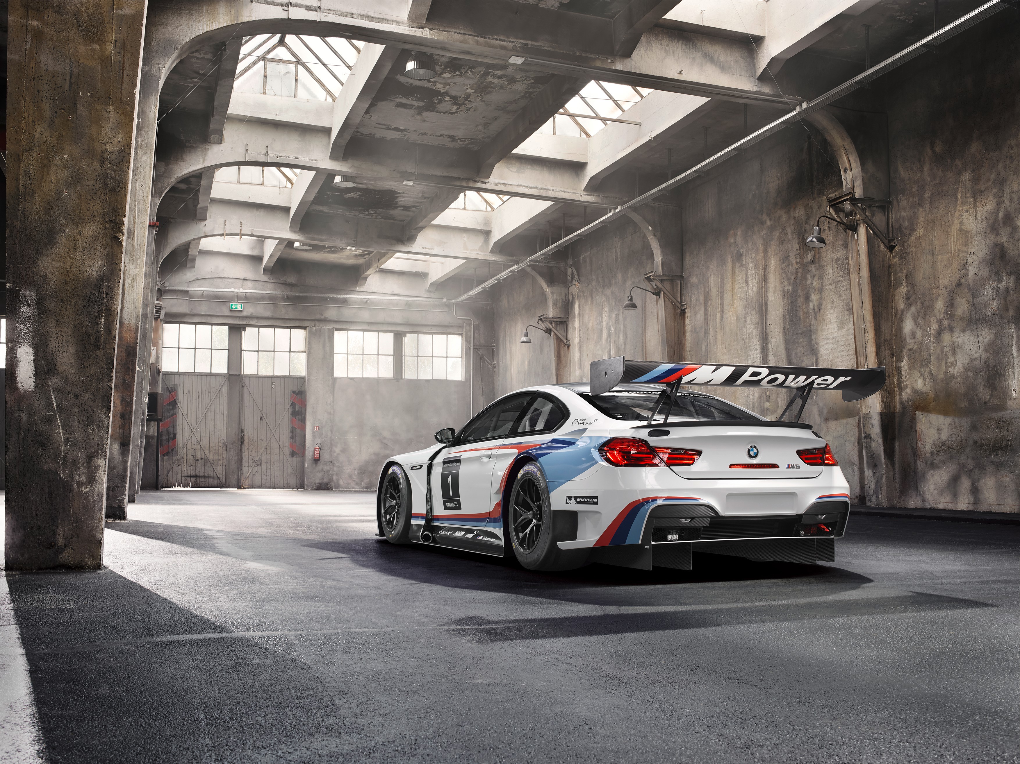 BMW M6 GT3 F13 race car in garage HD Wallpaper
