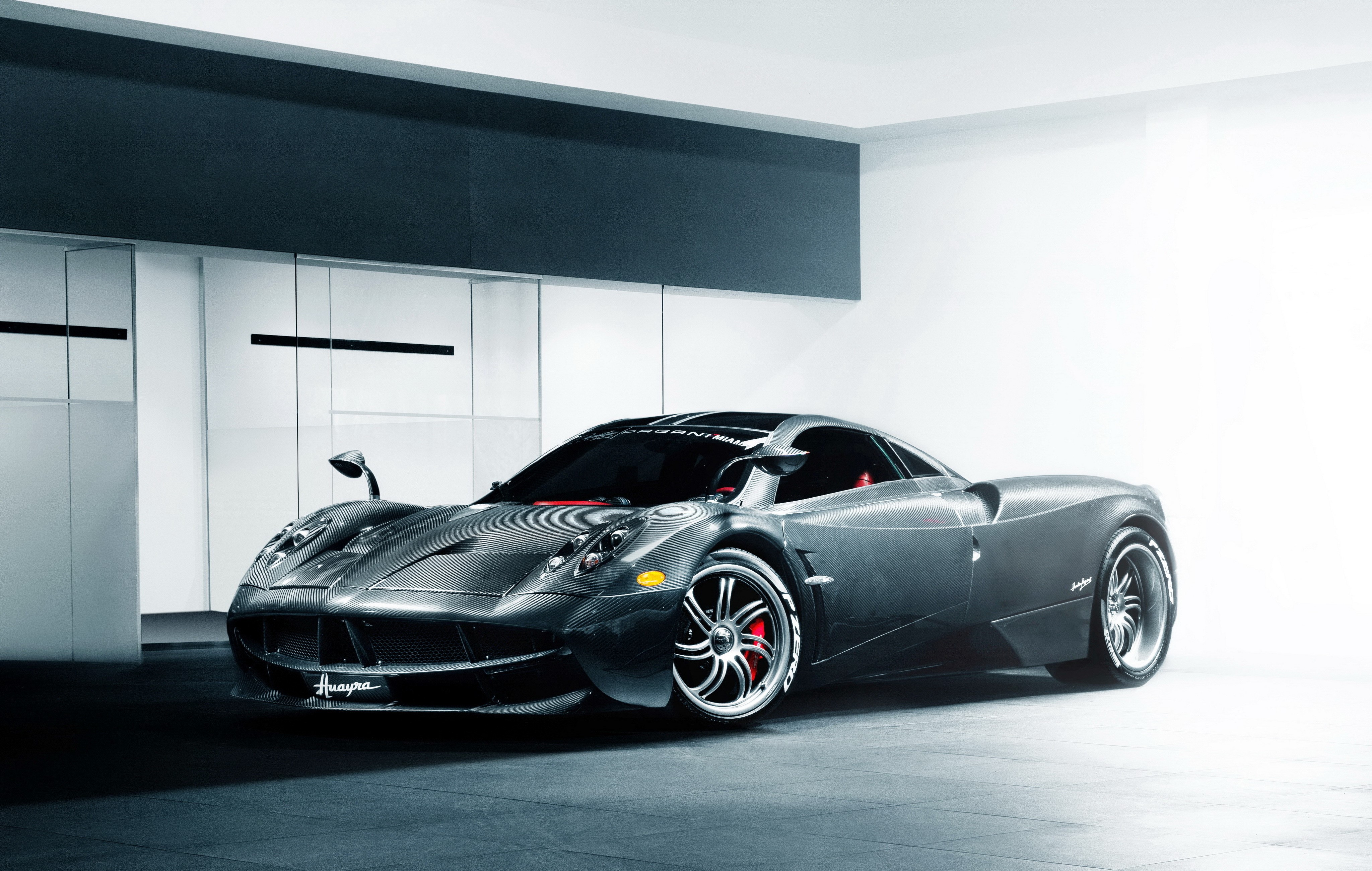 4K Pagani Huayra in a modern garage HD Wallpaper