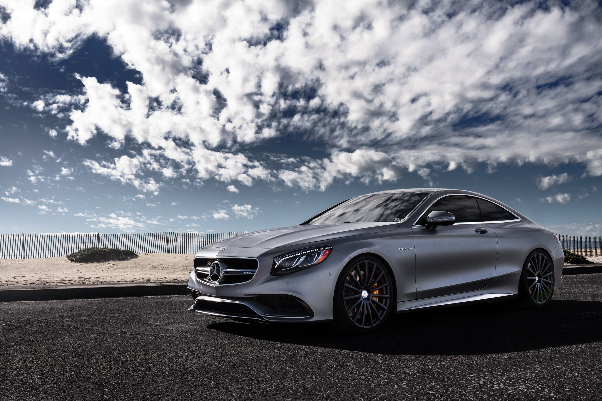 Mercedes-Benz S63 AMG Coupe on a beach road HD Wallpaper