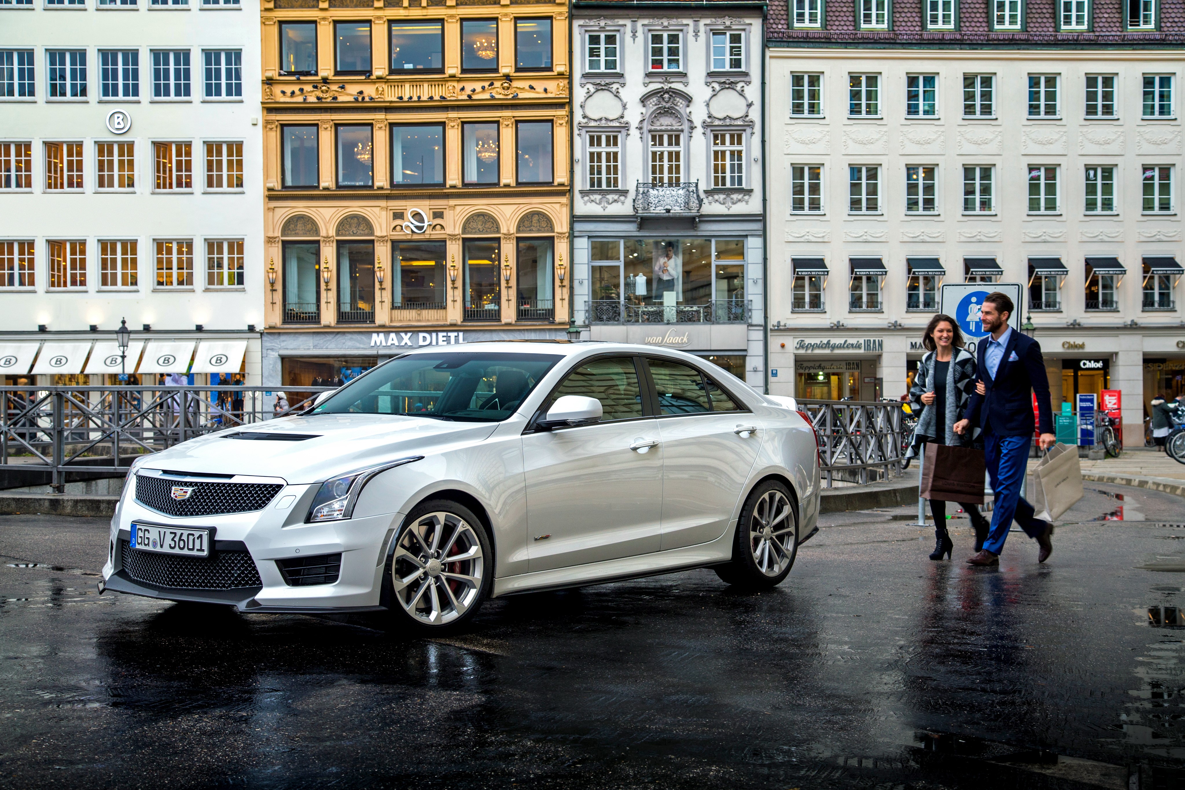 White Cadillac ATS on a Wet Street HD Wallpaper