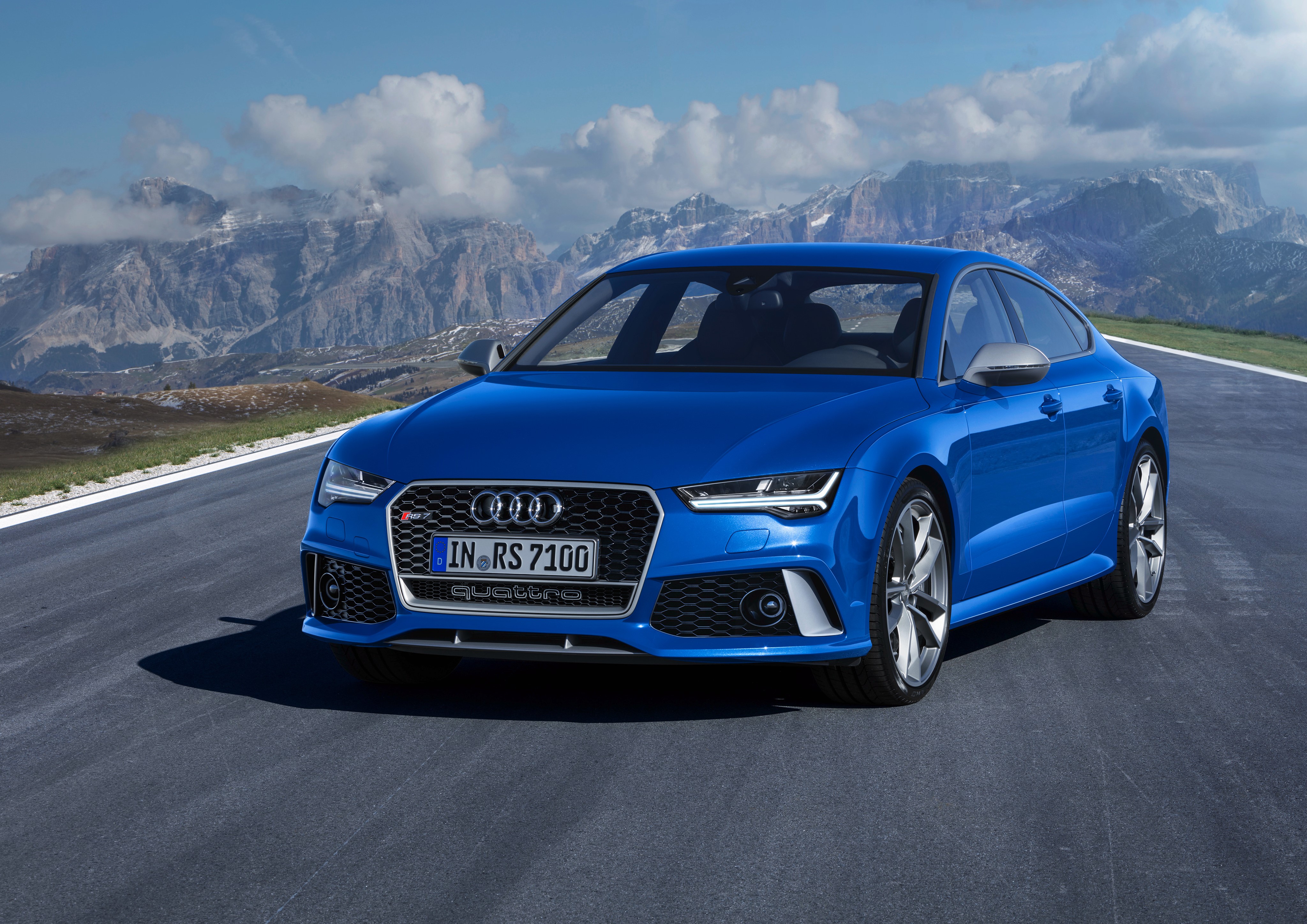 Blue Audi RS 7 Quattro on a Mountain Road HD Wallpaper