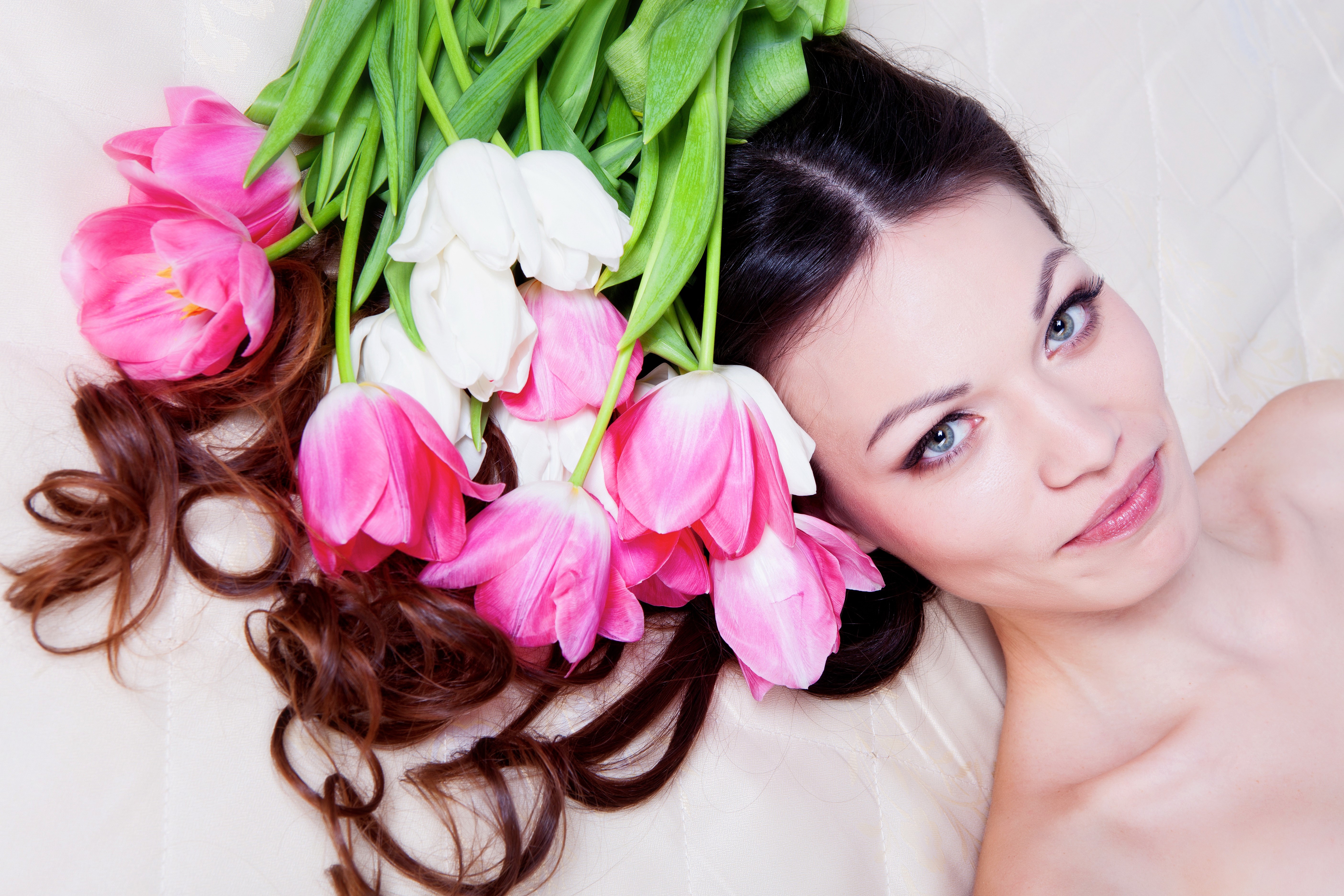Woman with Brown Hair and Tulips HD Wallpaper