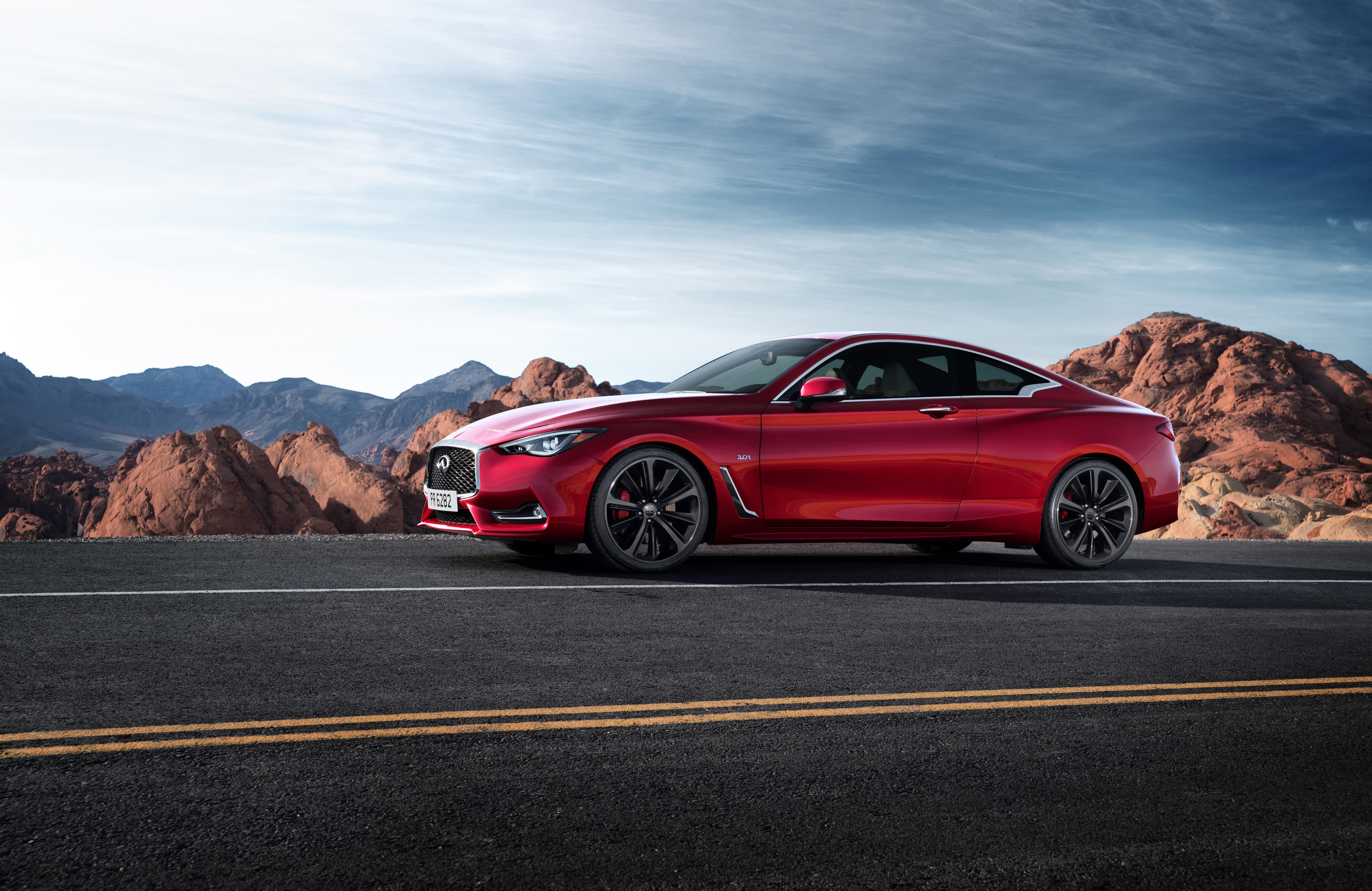 Red 2016 Infiniti Q60 Coupe on a Road HD Wallpaper