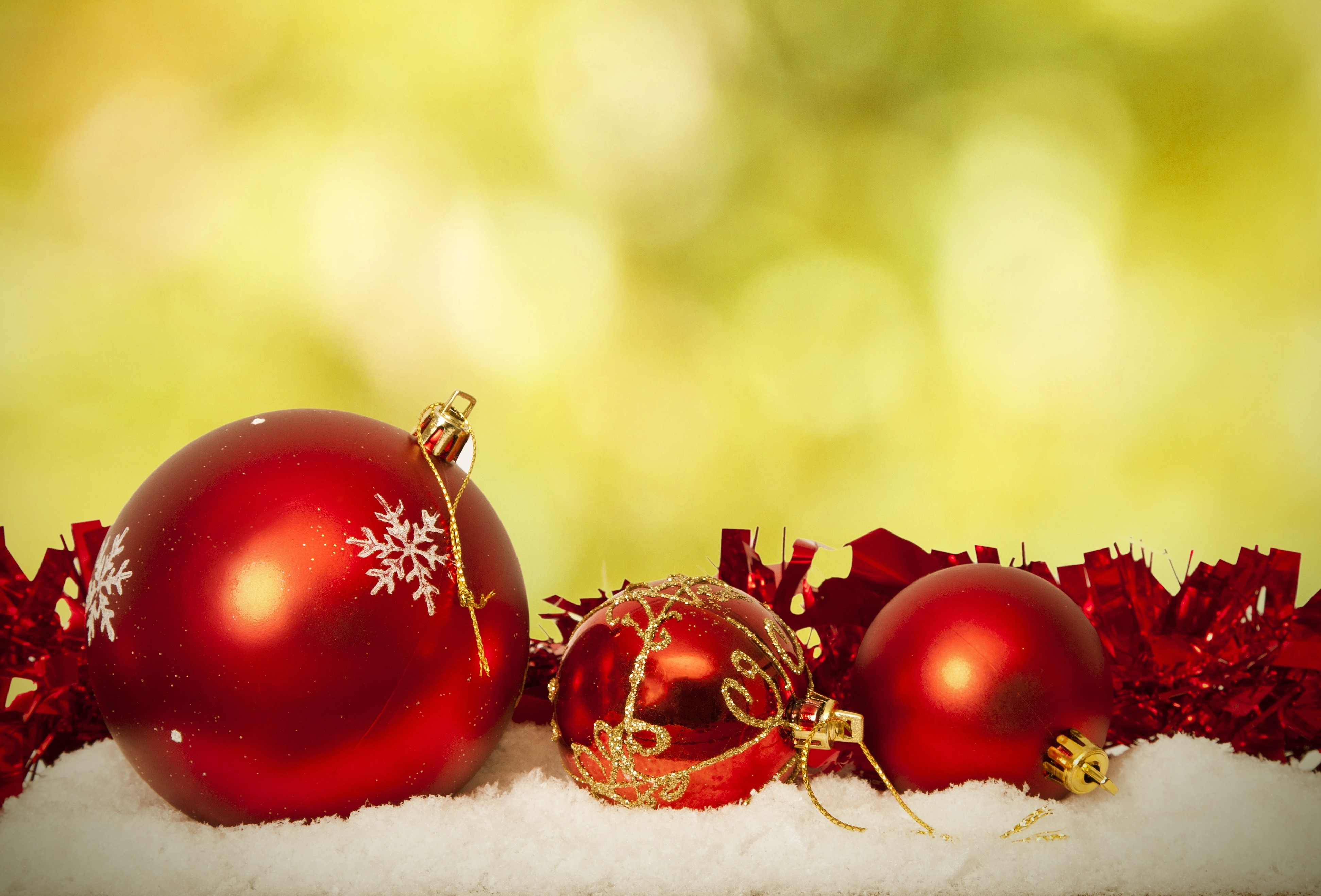 Red Christmas Ornaments on Snow HD Wallpaper