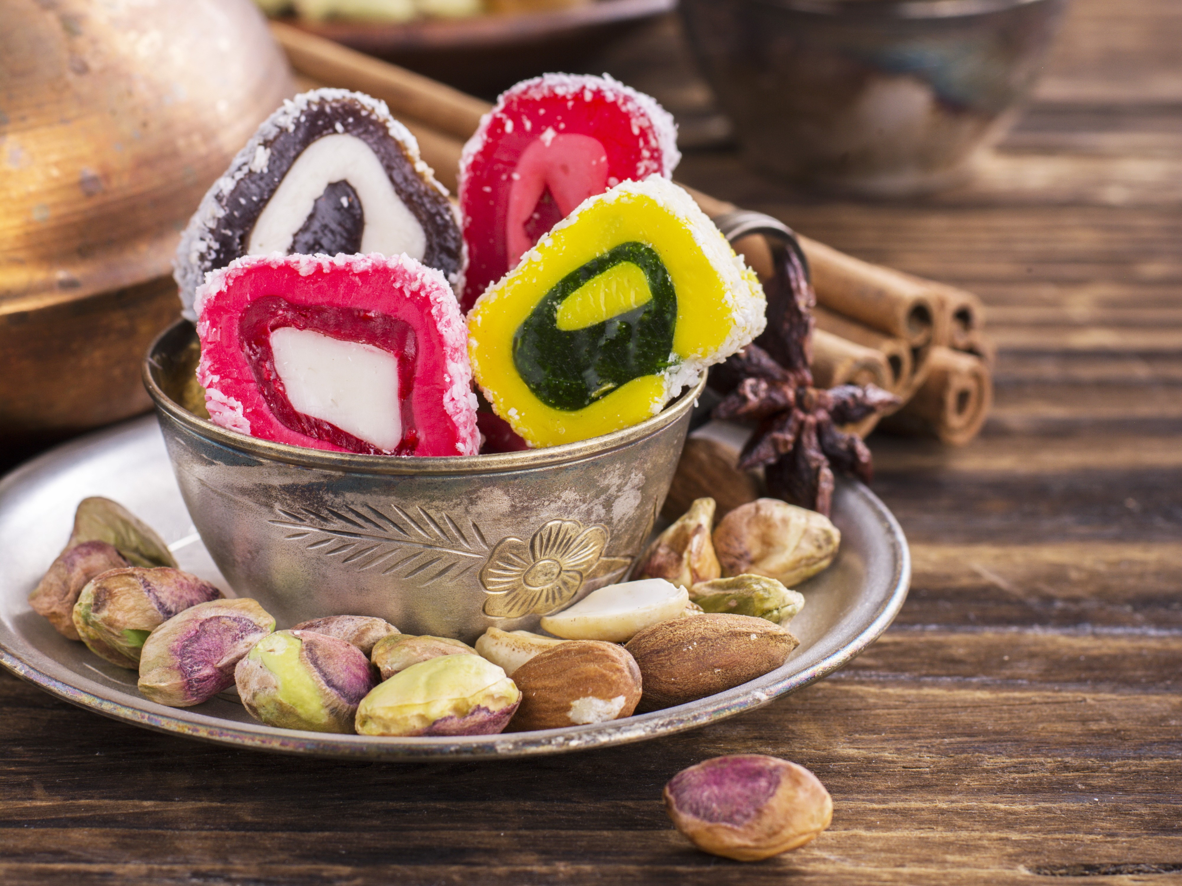 Turkish delight and nuts in a bowl HD Wallpaper