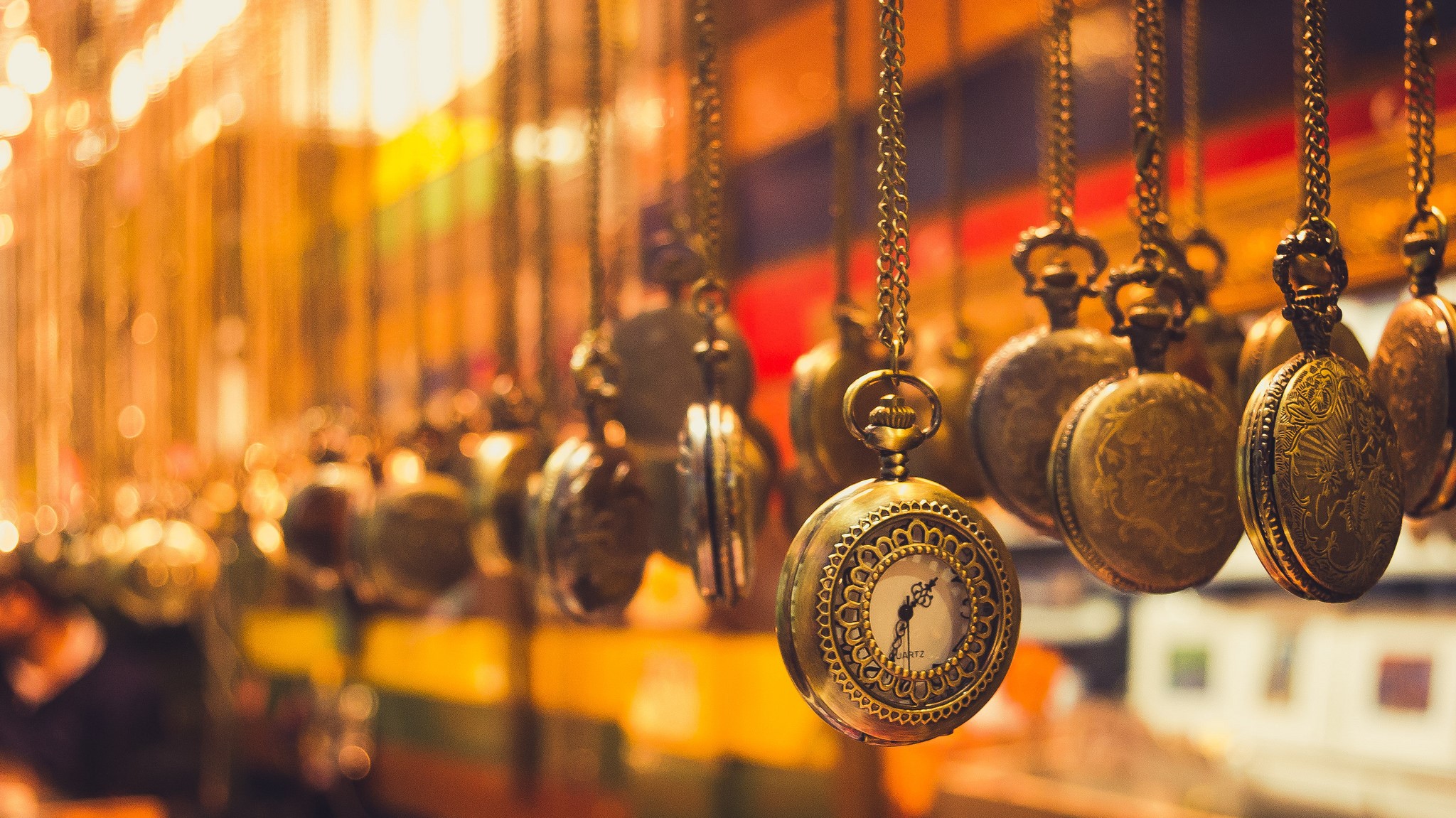 Many antique pocket watches hanging on chains HD Wallpaper