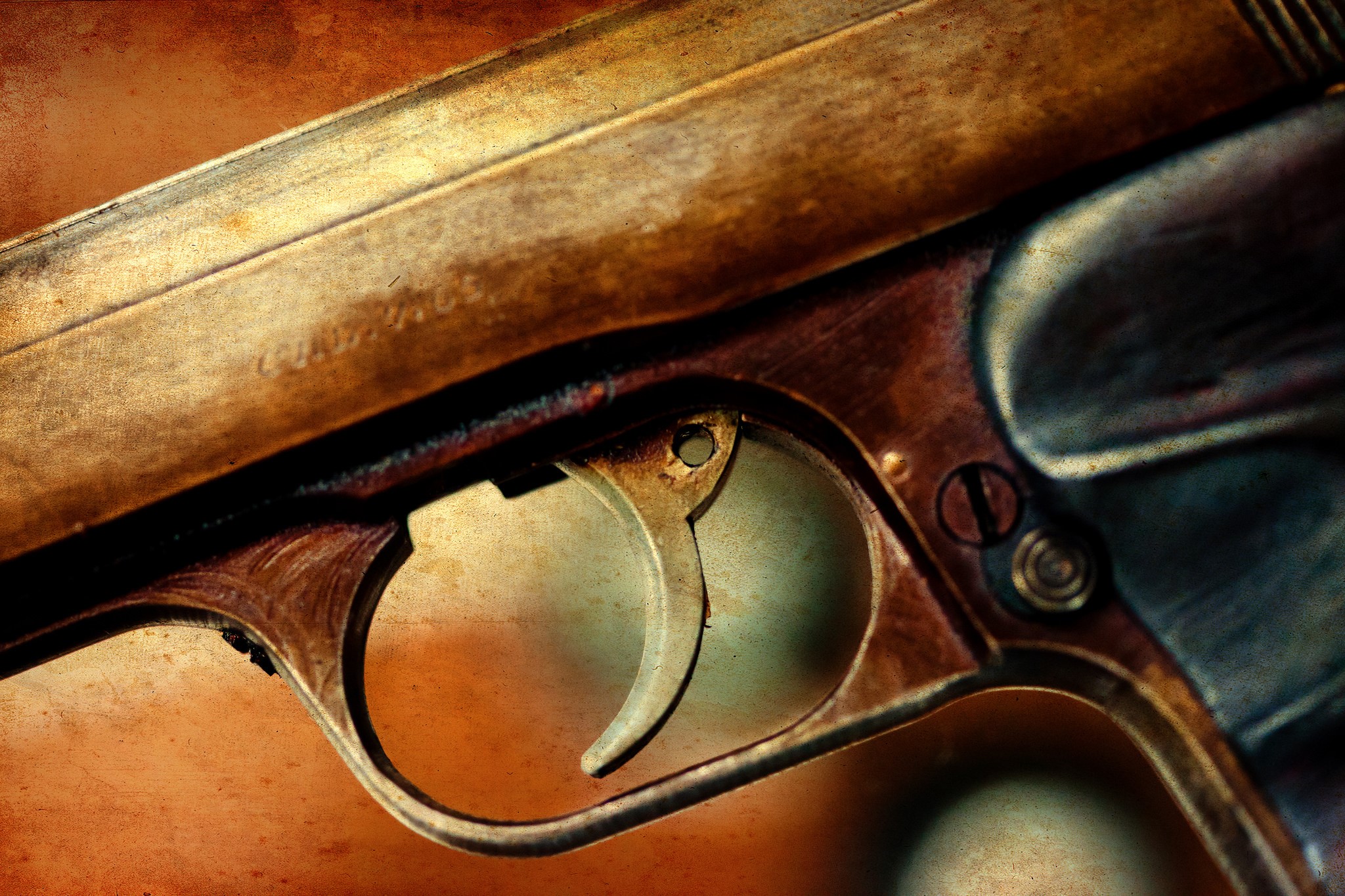Close-up of a vintage pistol trigger HD Wallpaper