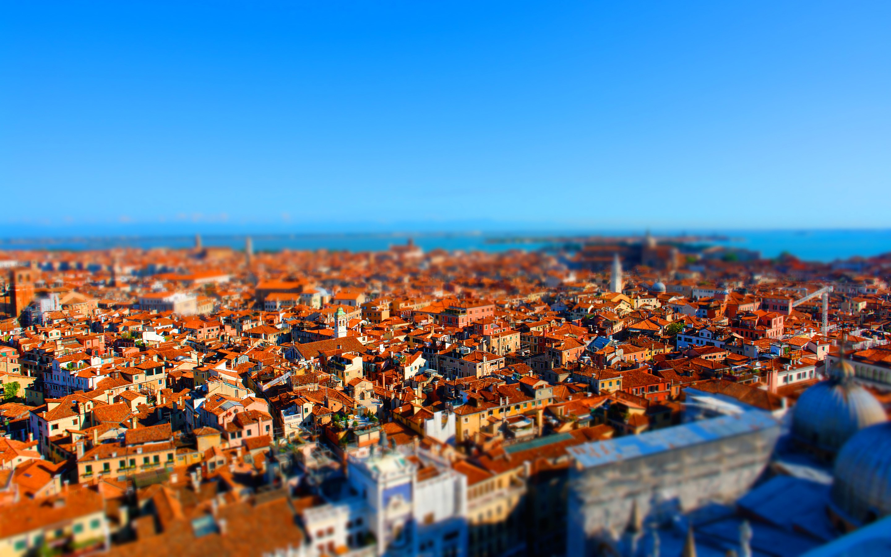 Tilt-shift view of Venice rooftops from above HD Wallpaper