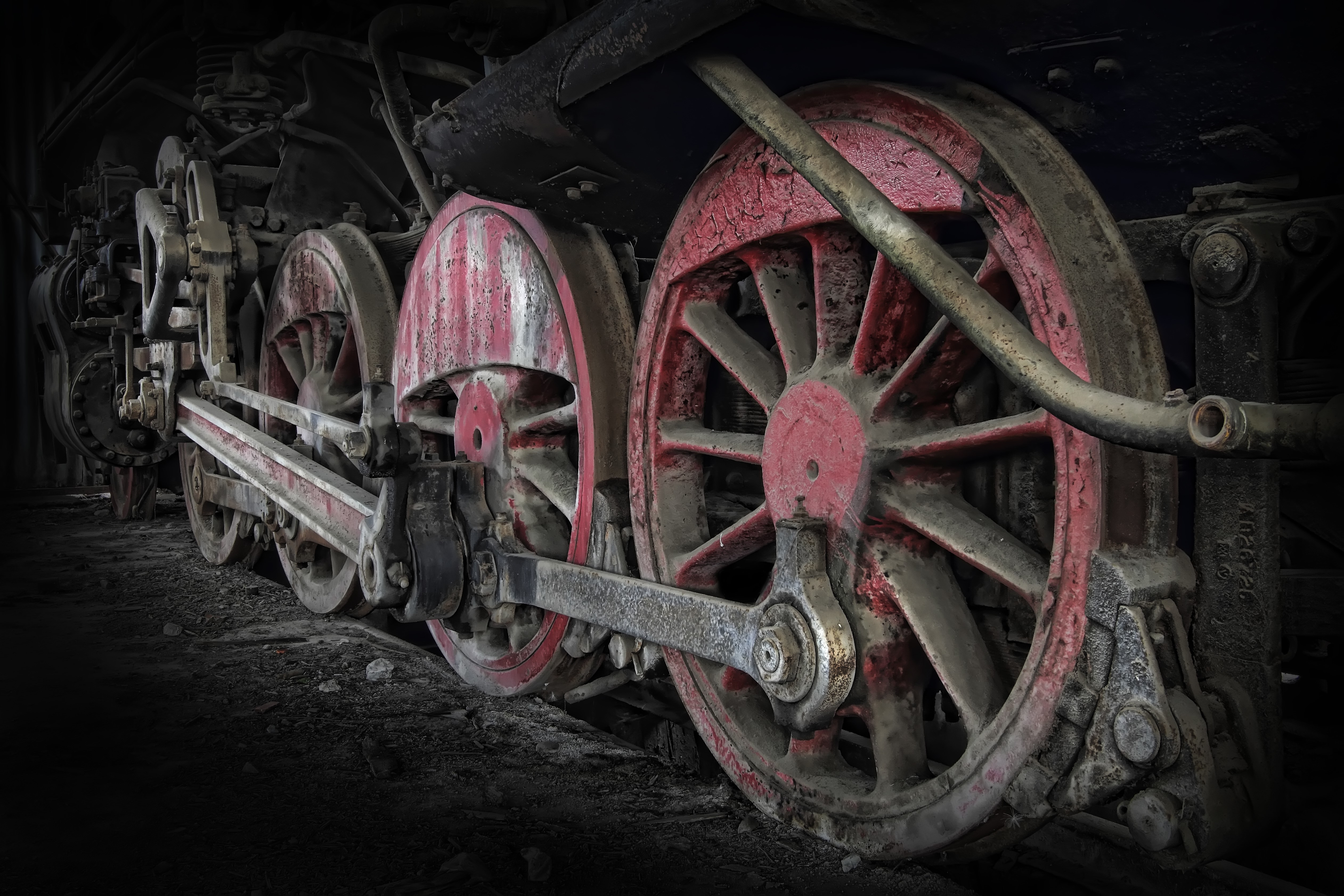 Closeup of a vintage locomotive wheel HD Wallpaper