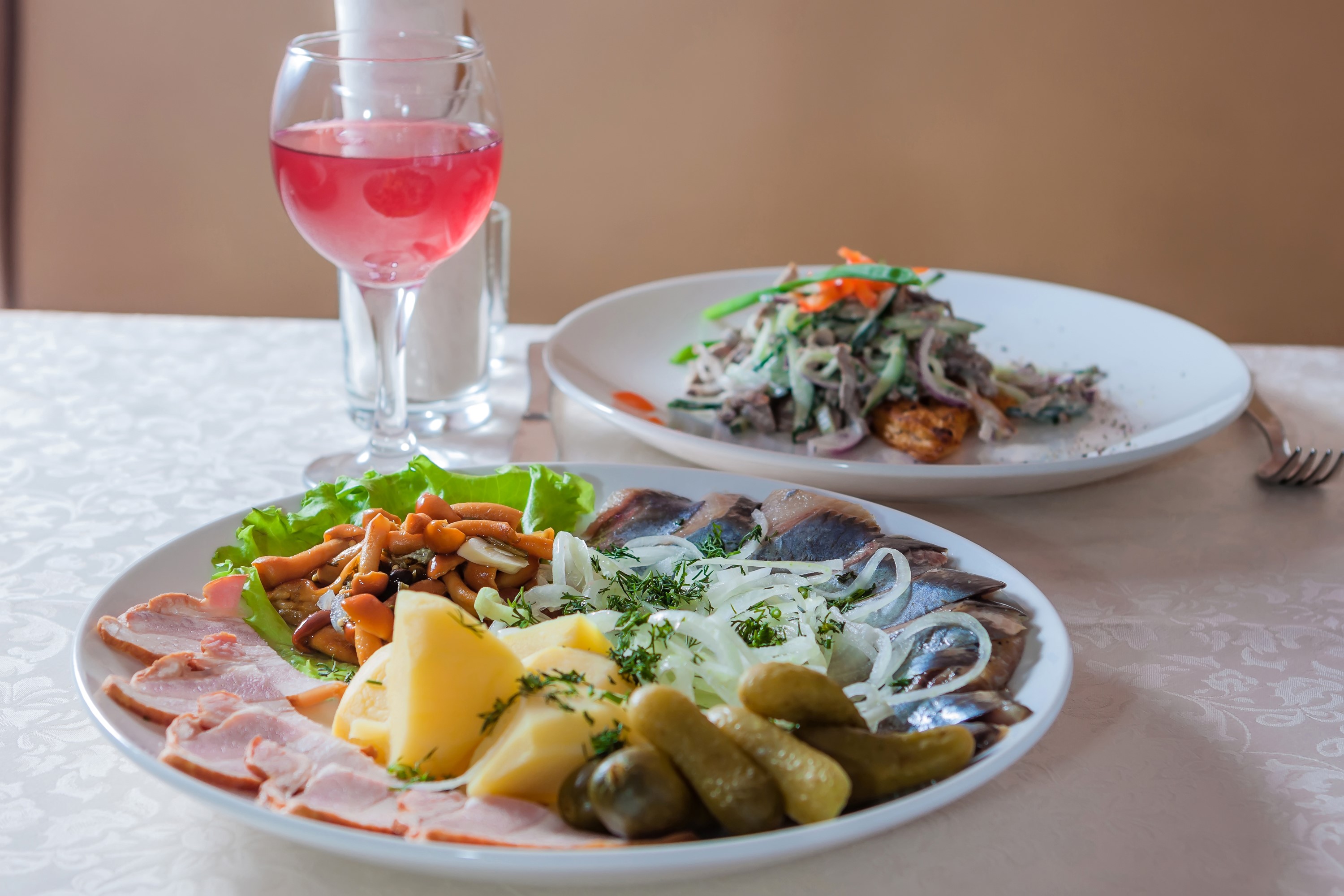 Appetizer platter with ham, potatoes, mushrooms, herring, and pickles HD Wallpaper