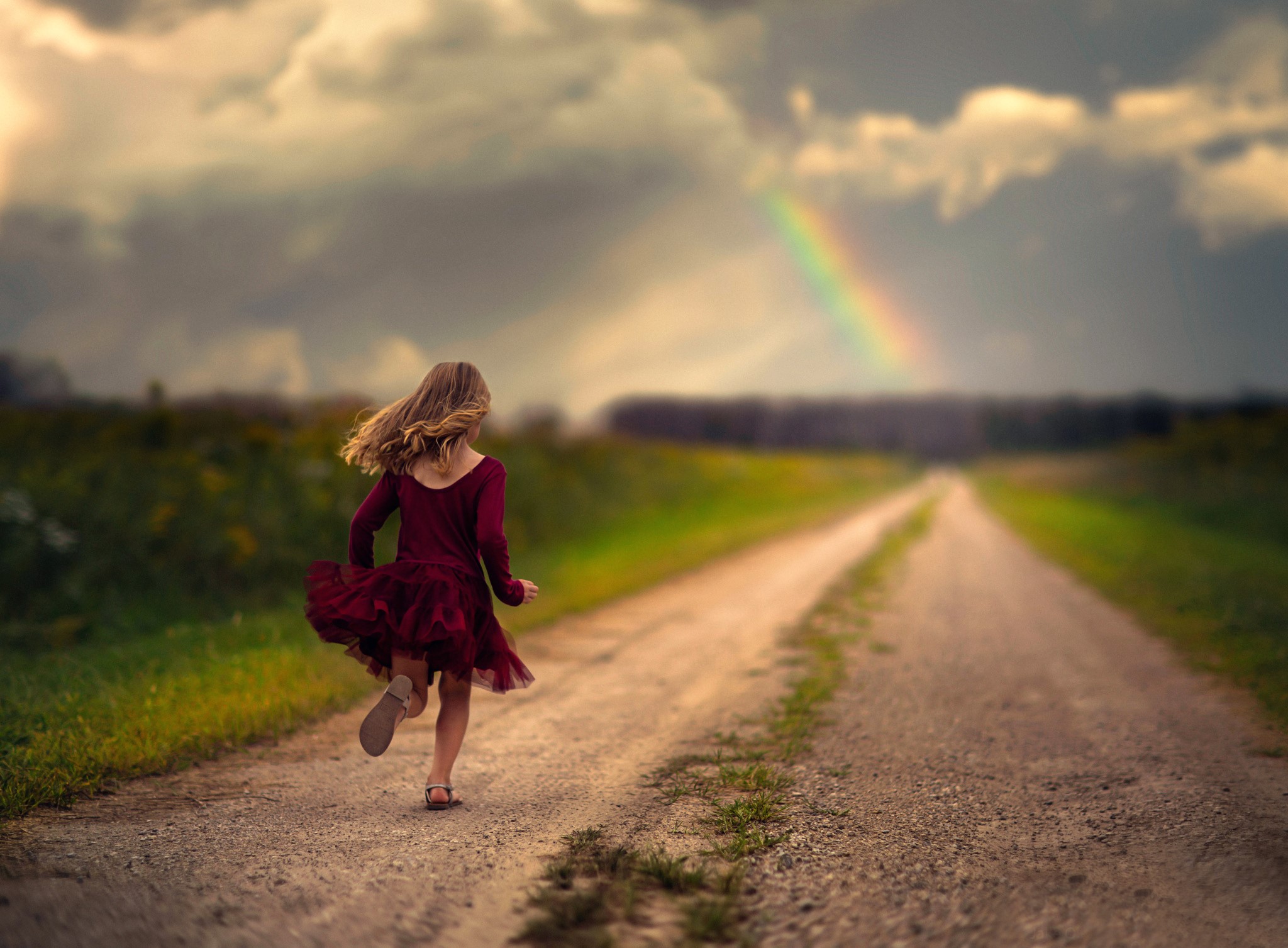 Girl Running on Road Toward Rainbow HD Wallpaper