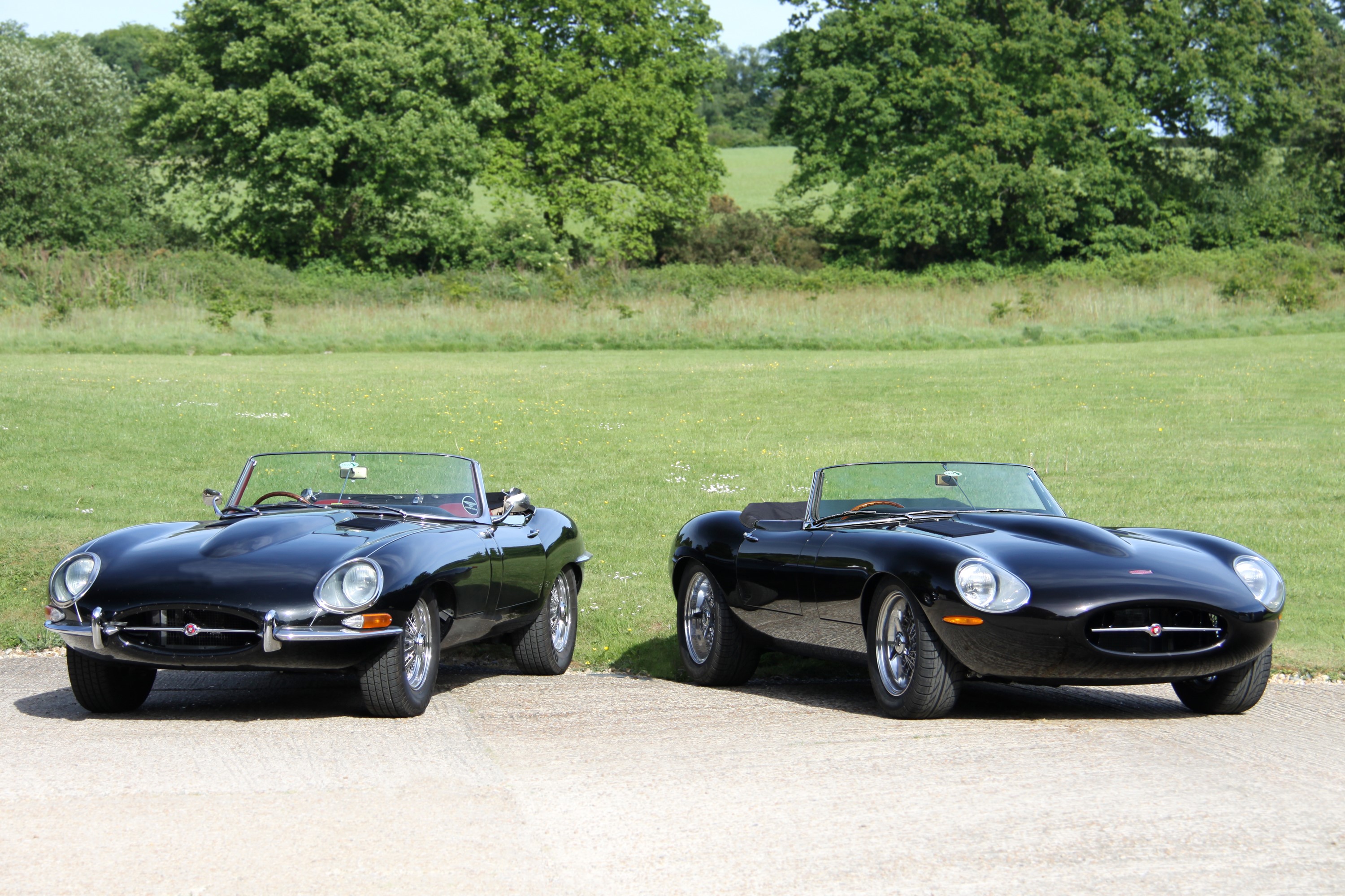 Two black Eagle Spyder GT convertible cars HD Wallpaper