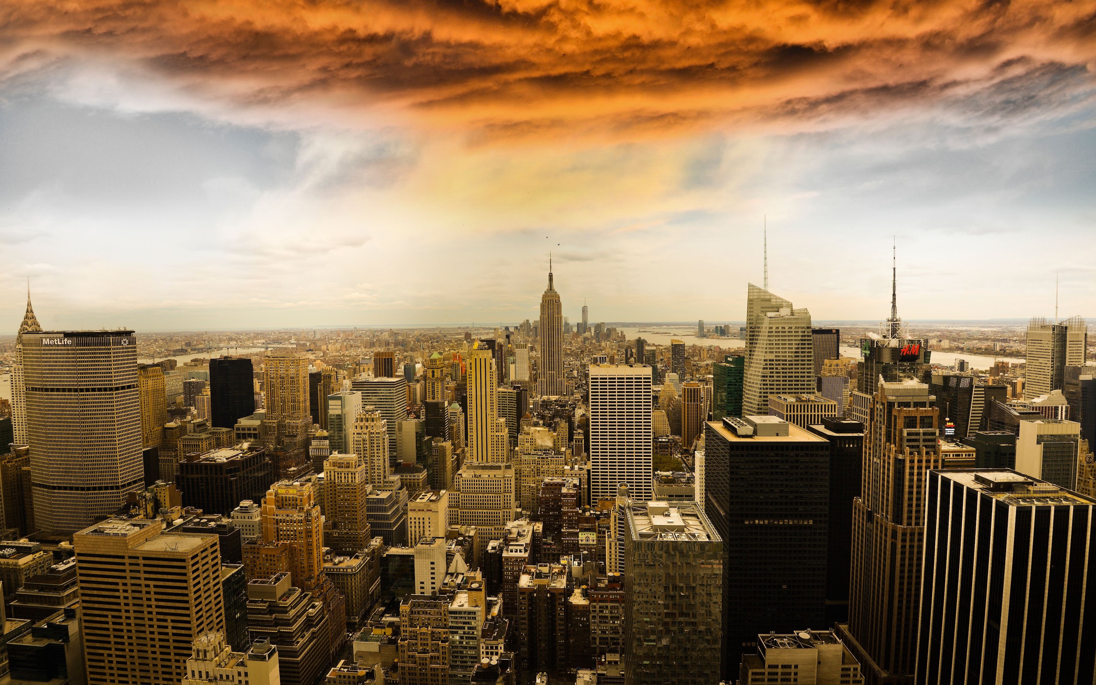 New York City Skyline with Dramatic Clouds HD Wallpaper