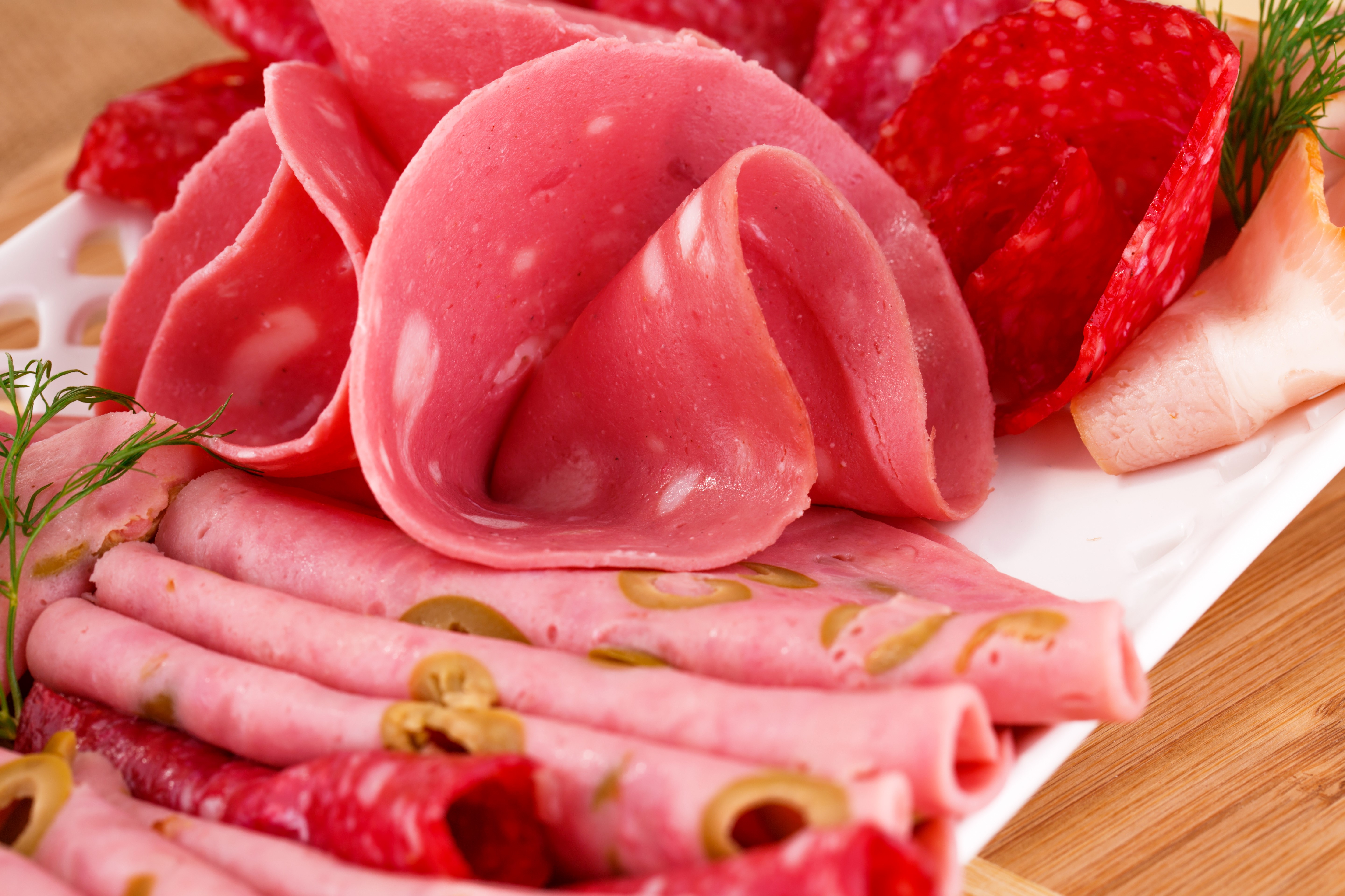 Assortment of Sliced Meat Products and Sausages HD Wallpaper