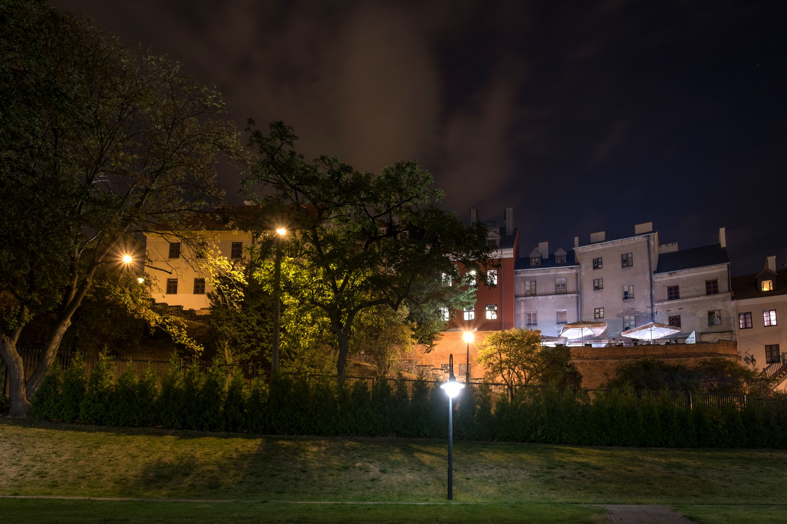 Houses and trees at night in Lublin, Poland HD Wallpaper