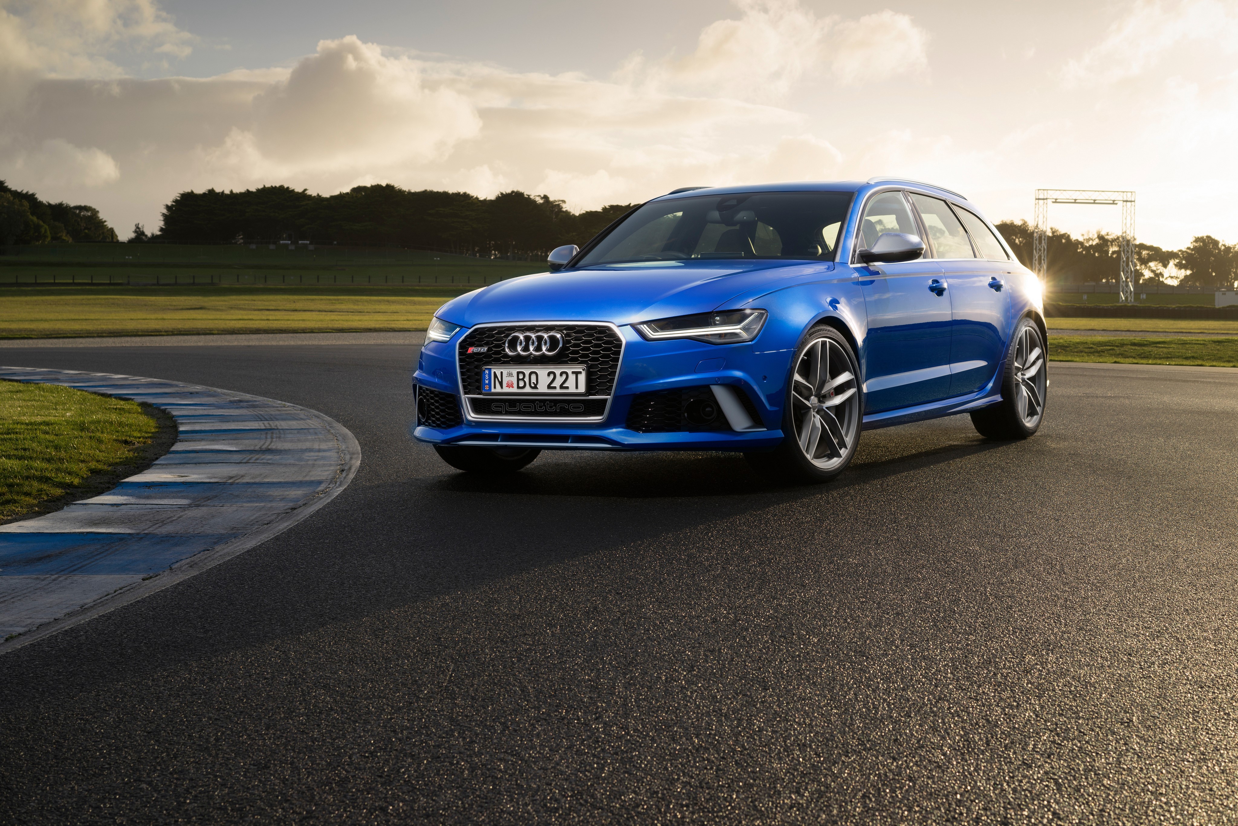 Blue Audi RS 6 Avant on a Race Track HD Wallpaper