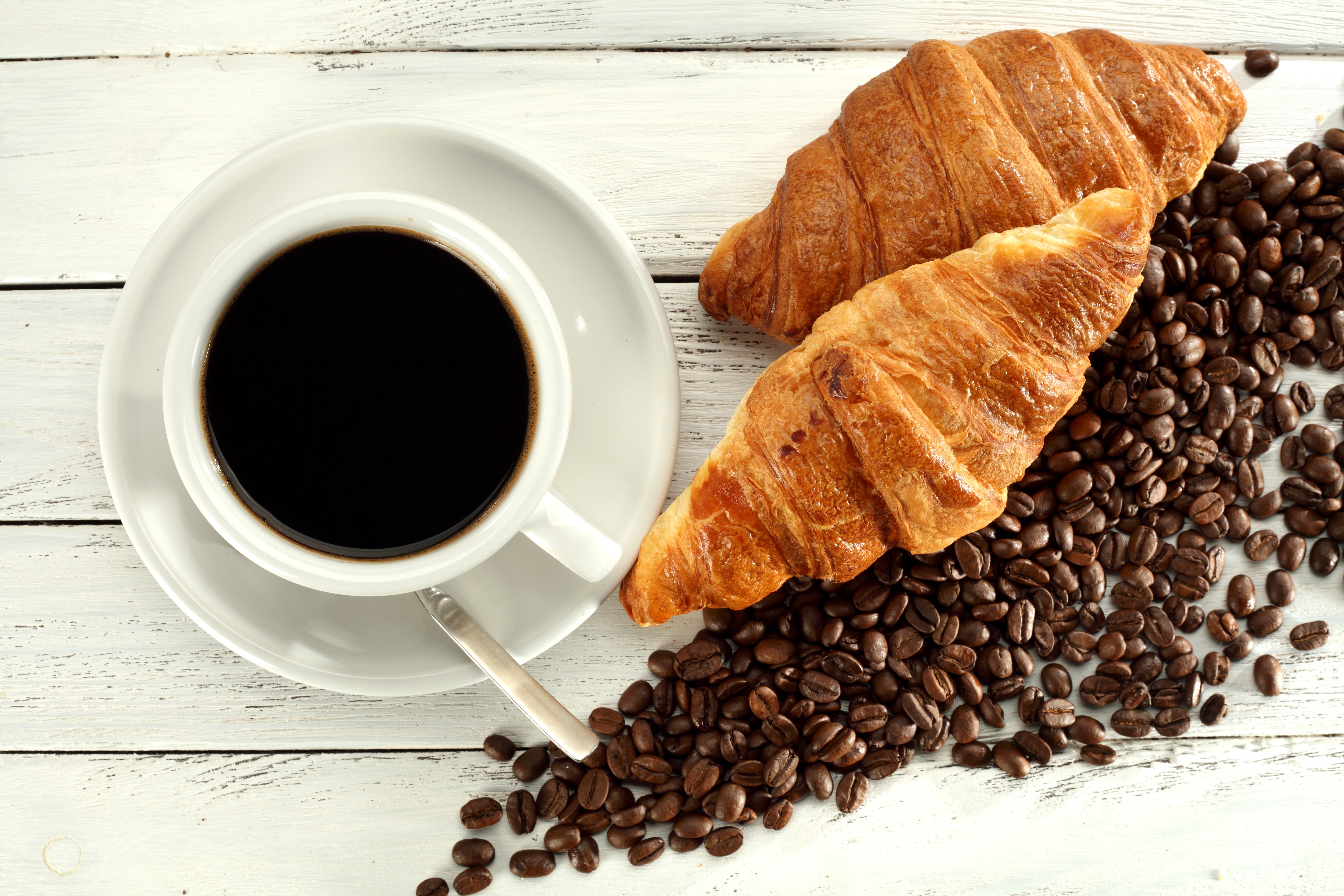 Coffee cup with croissants and coffee beans HD Wallpaper