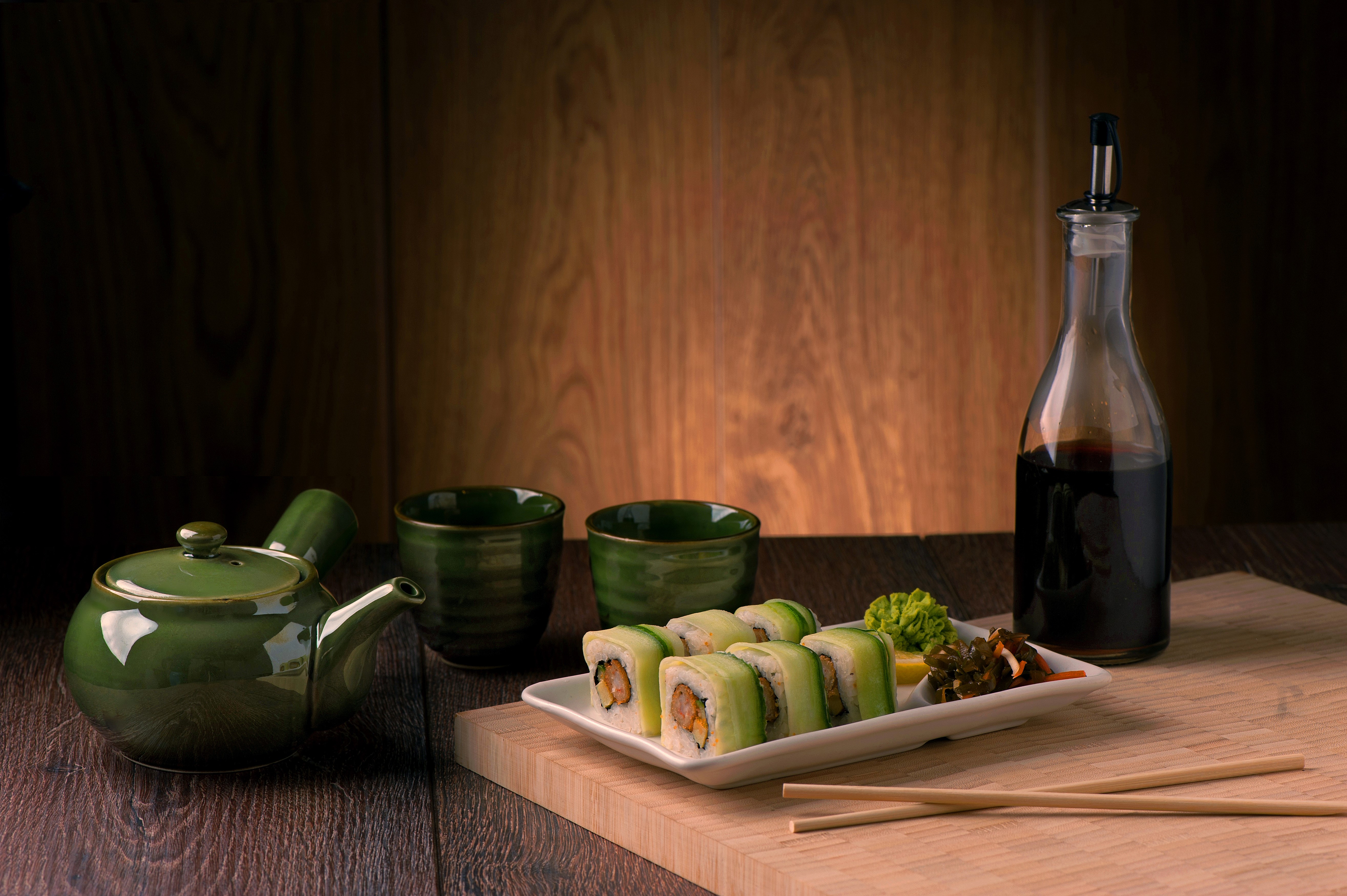 Sushi with Tea Set and Soy Sauce Bottle HD Wallpaper