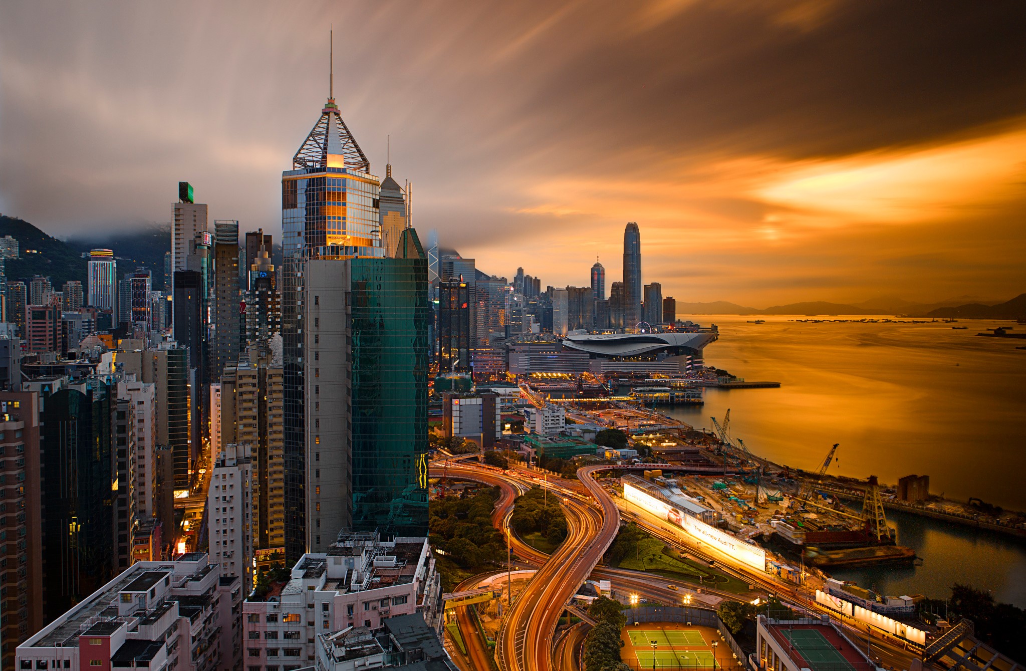 Hong Kong Skyline at Sunset with Harbor and Highways HD Wallpaper