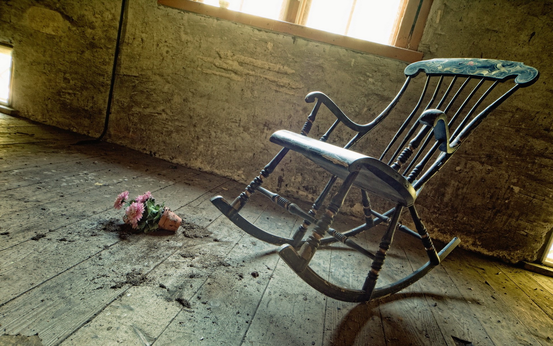 Old rocking chair and flowers in an abandoned room HD Wallpaper