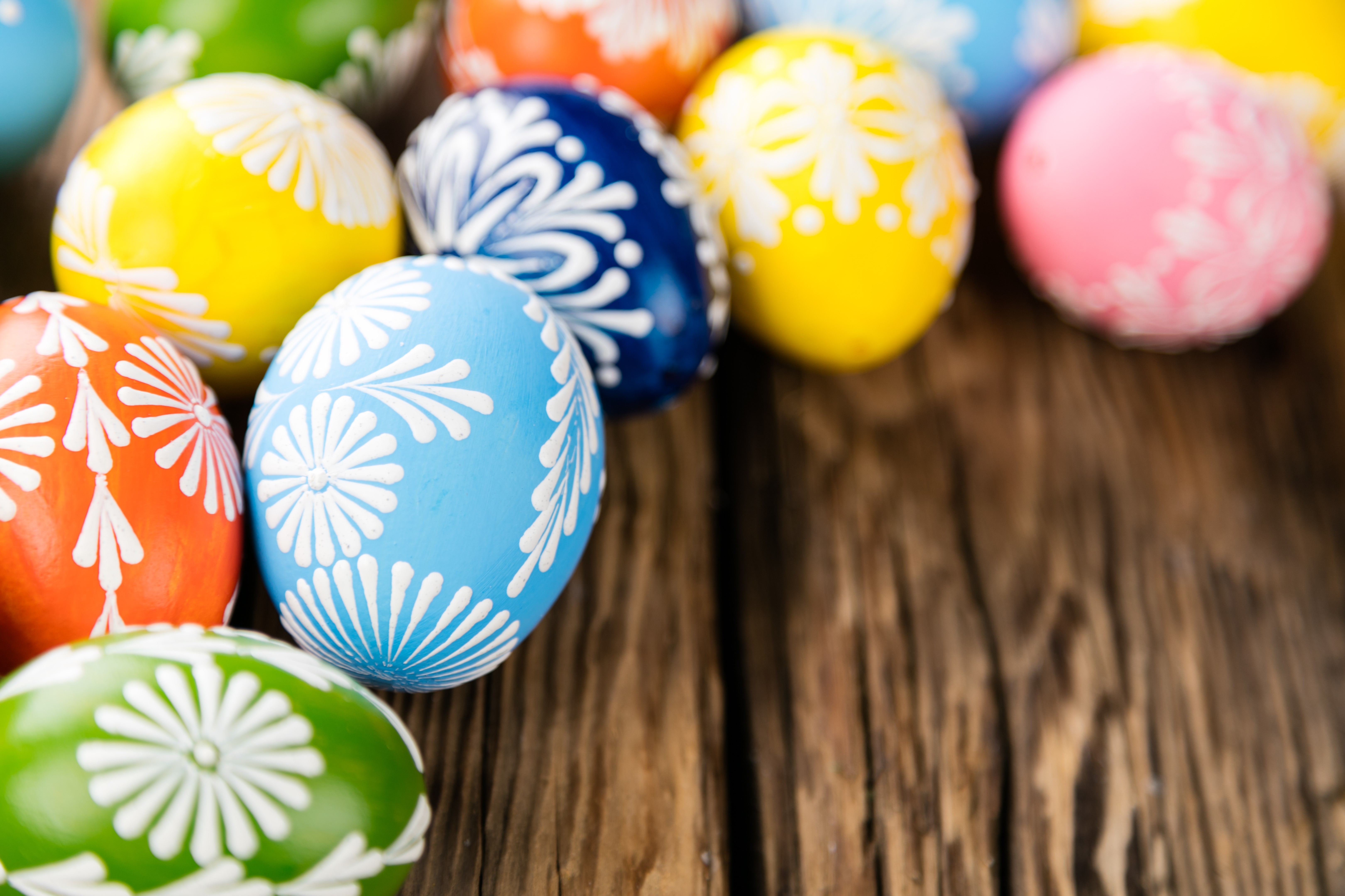Colorful Easter Eggs with White Designs on Wood HD Wallpaper
