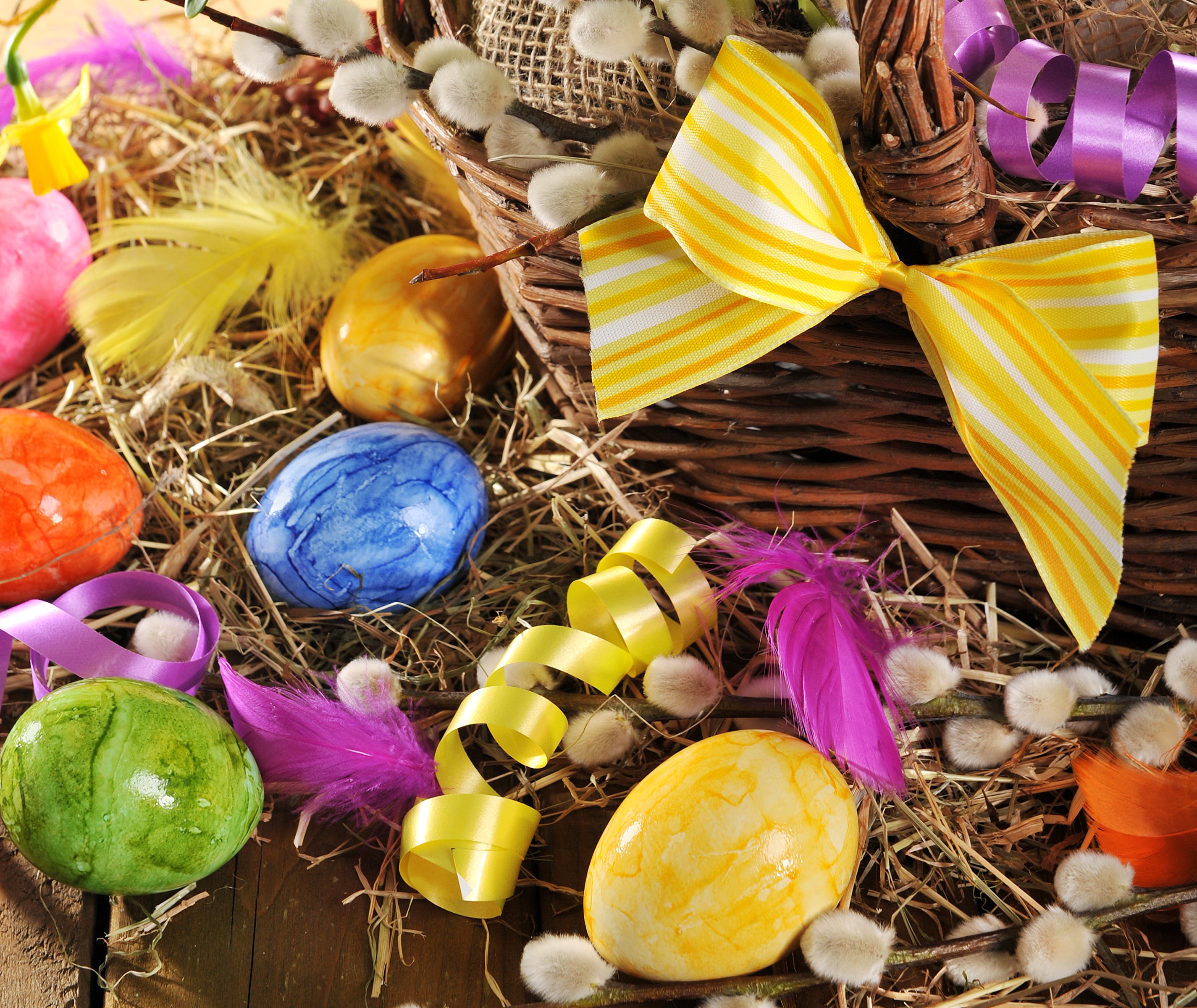 Easter eggs in a basket with decorations HD Wallpaper