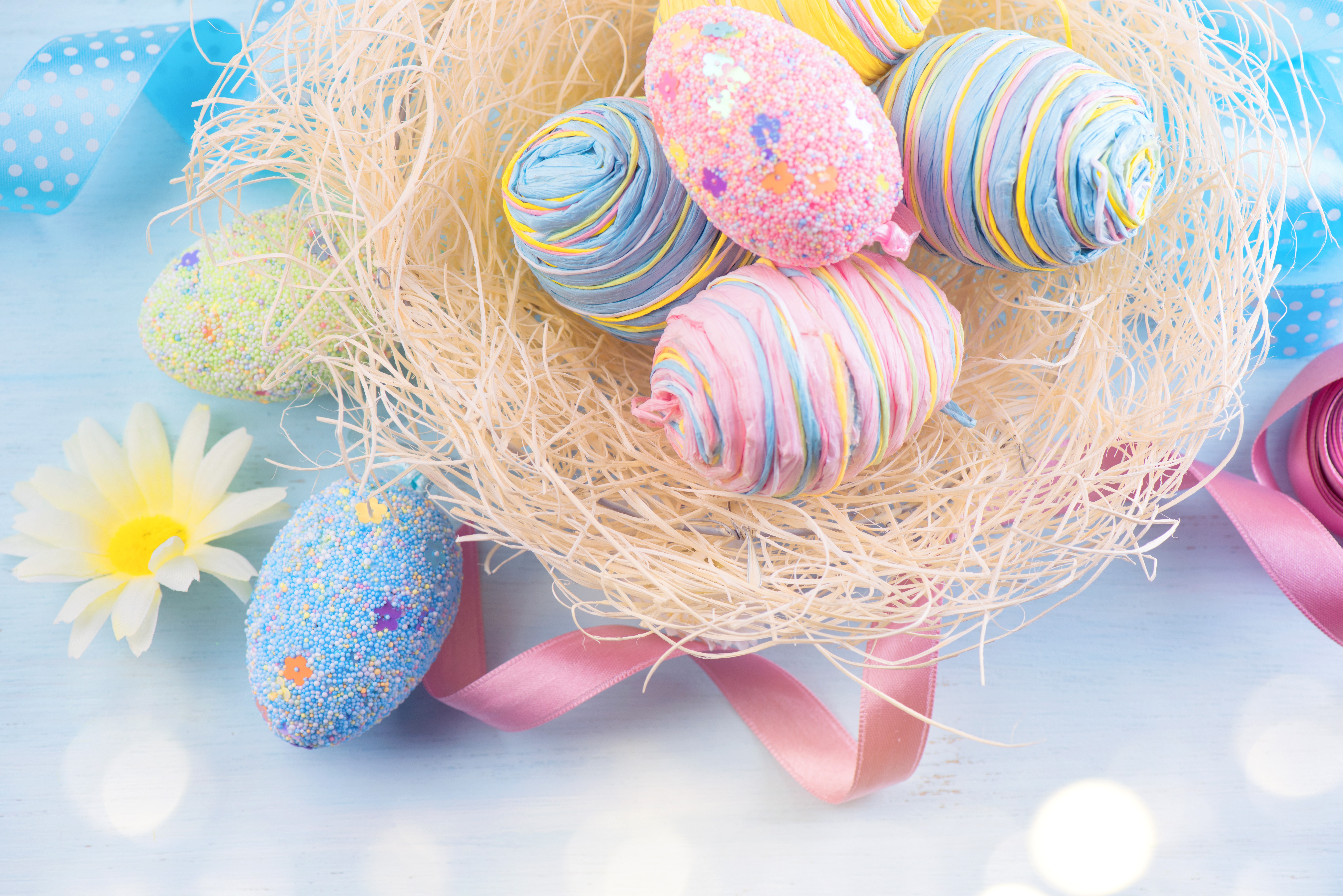 Easter Eggs in a Nest with Ribbons and Flower HD Wallpaper