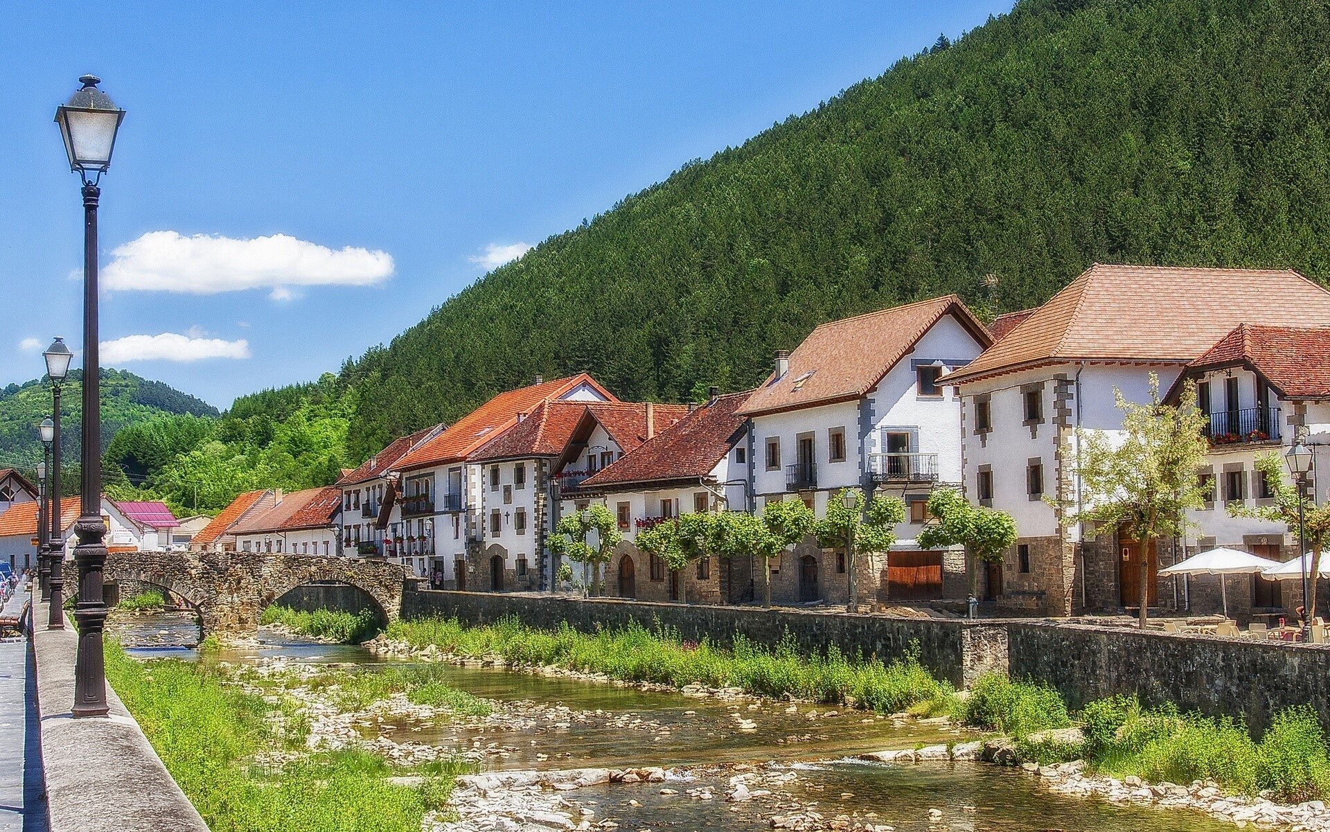 Ochagavia, Navarre, Spain: Houses along a river with a bridge HD Wallpaper