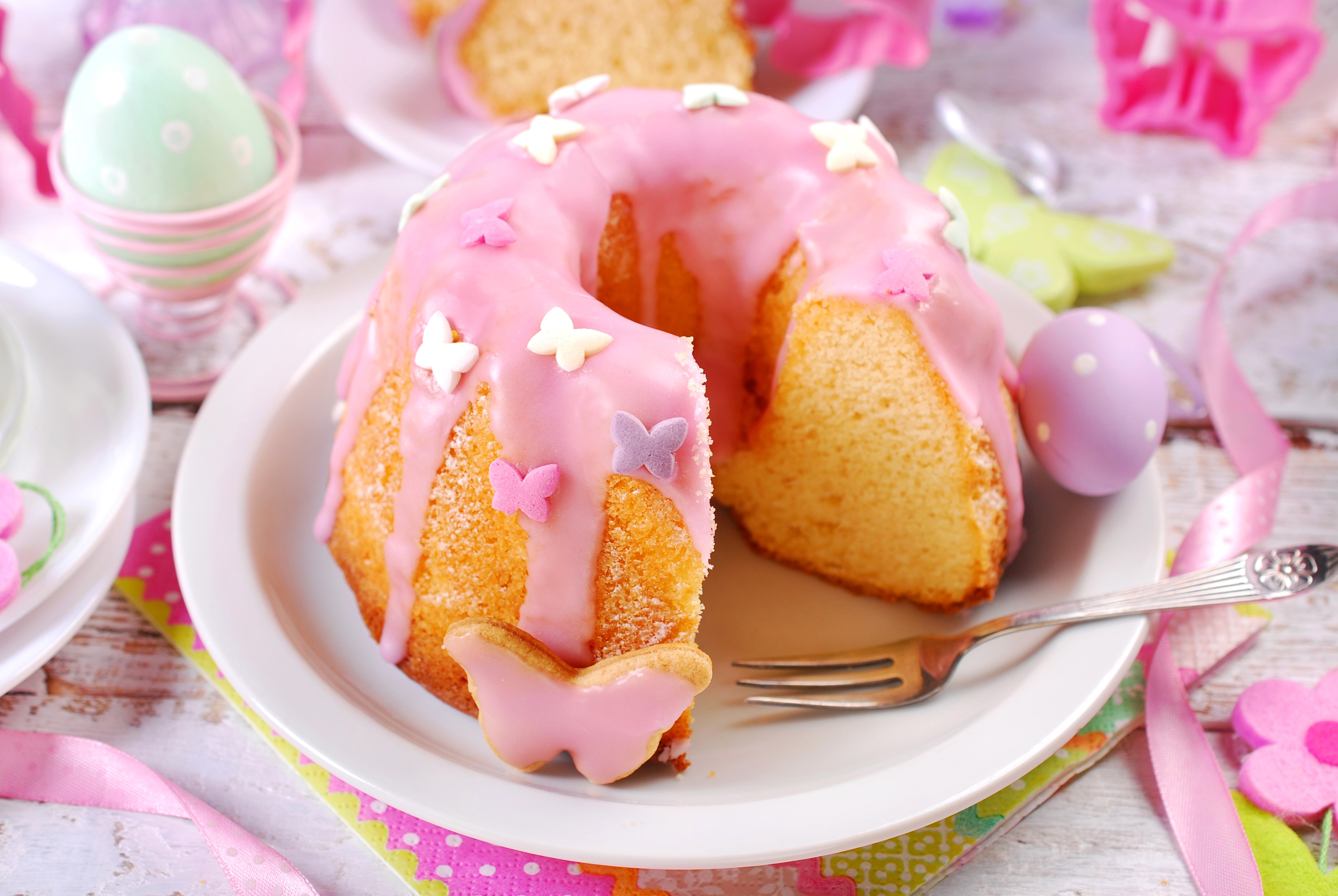 Easter Bundt Cake with Pink Icing and Butterfly Decorations HD Wallpaper