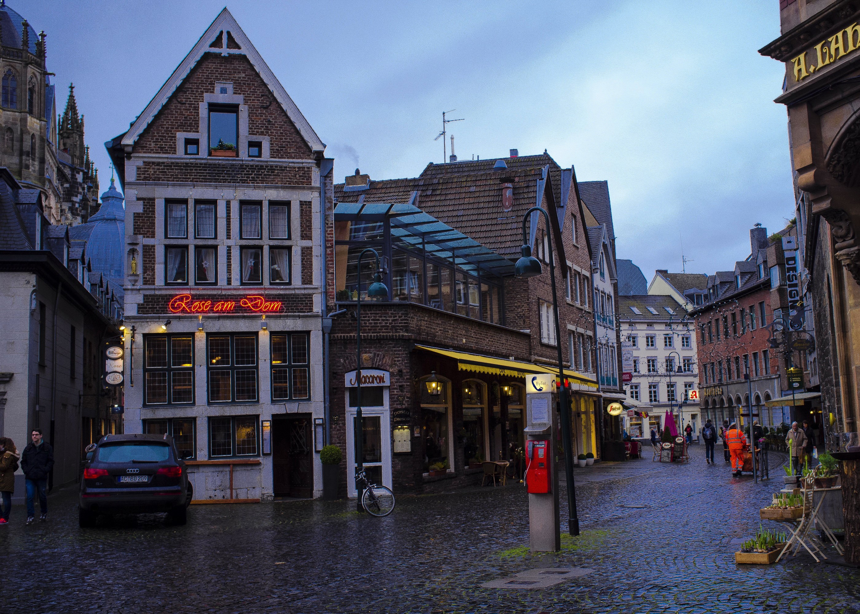 Street scene in Aachen, Germany at dusk HD Wallpaper