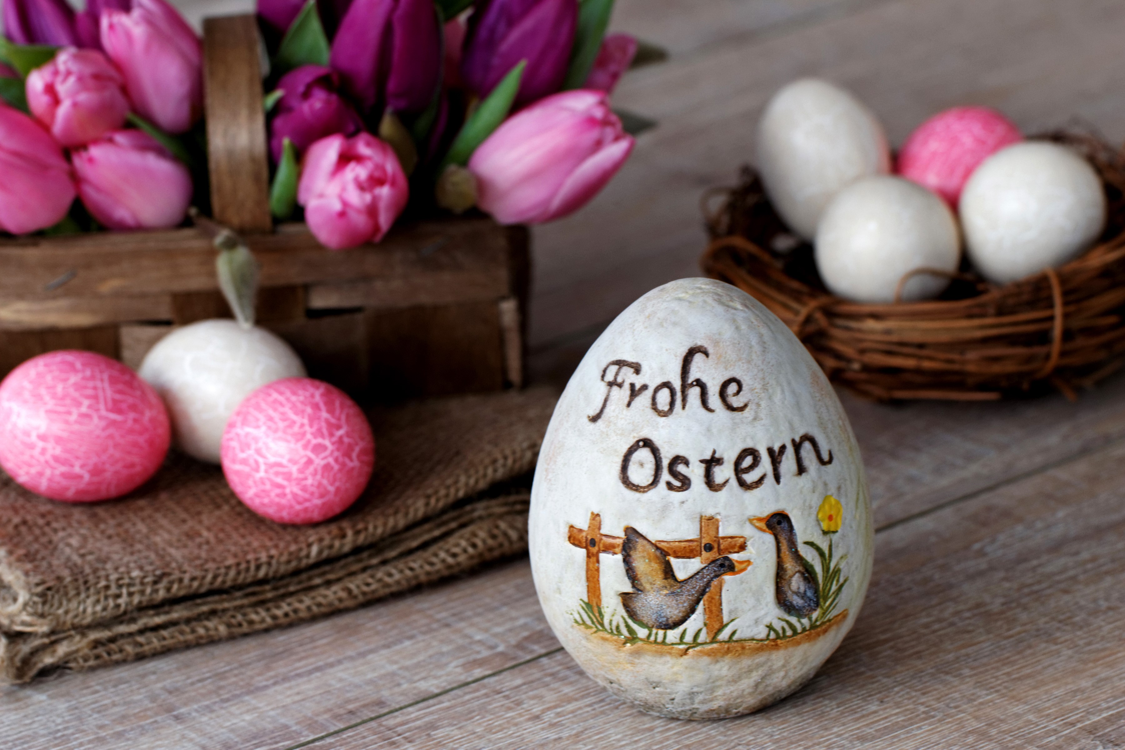 Easter eggs and tulips in a basket HD Wallpaper