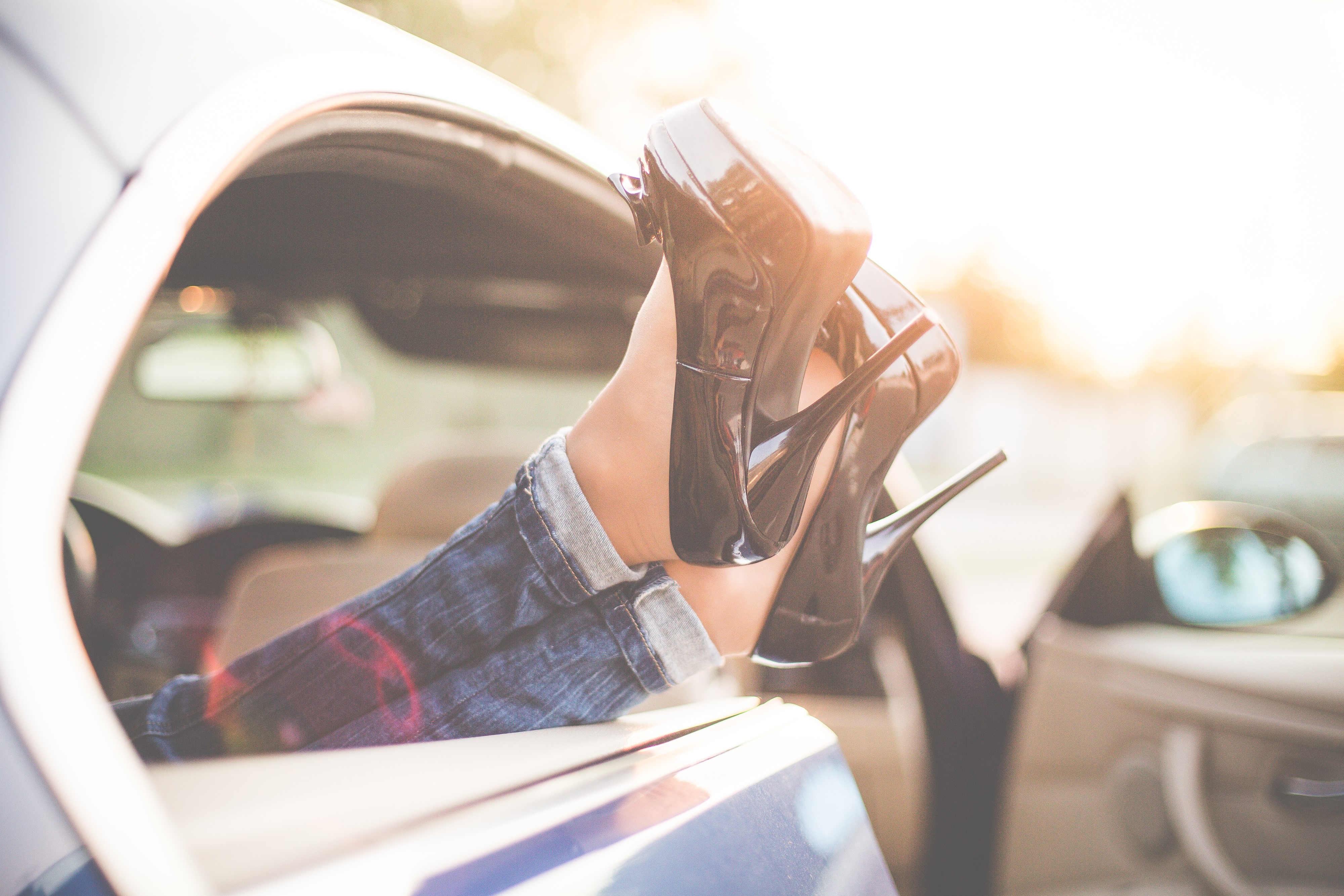 Legs in Stilettos Out of Car Window HD Wallpaper