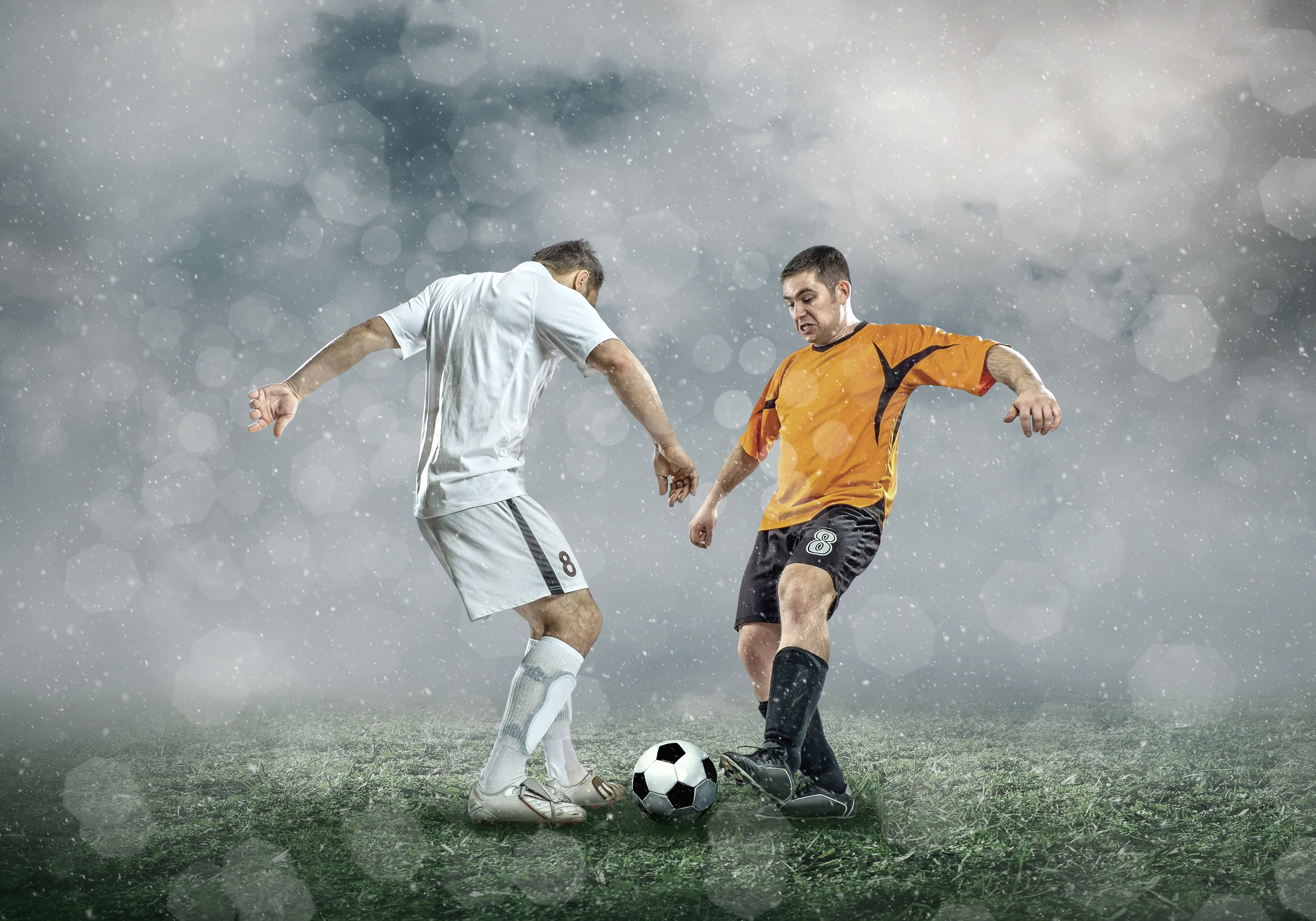 Two soccer players in a match HD Wallpaper