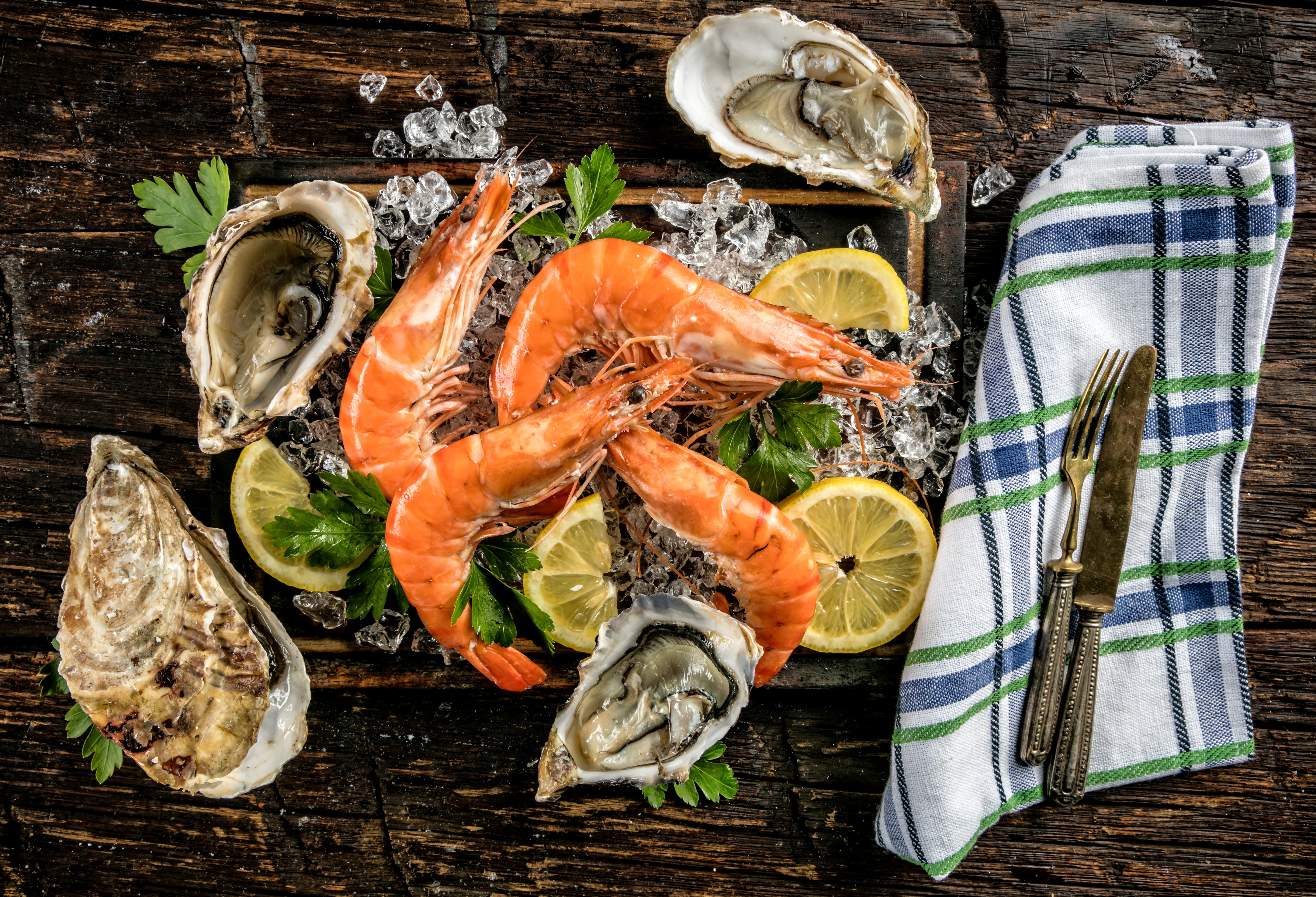 Shrimp and Oysters with Lemon and Parsley on Ice HD Wallpaper