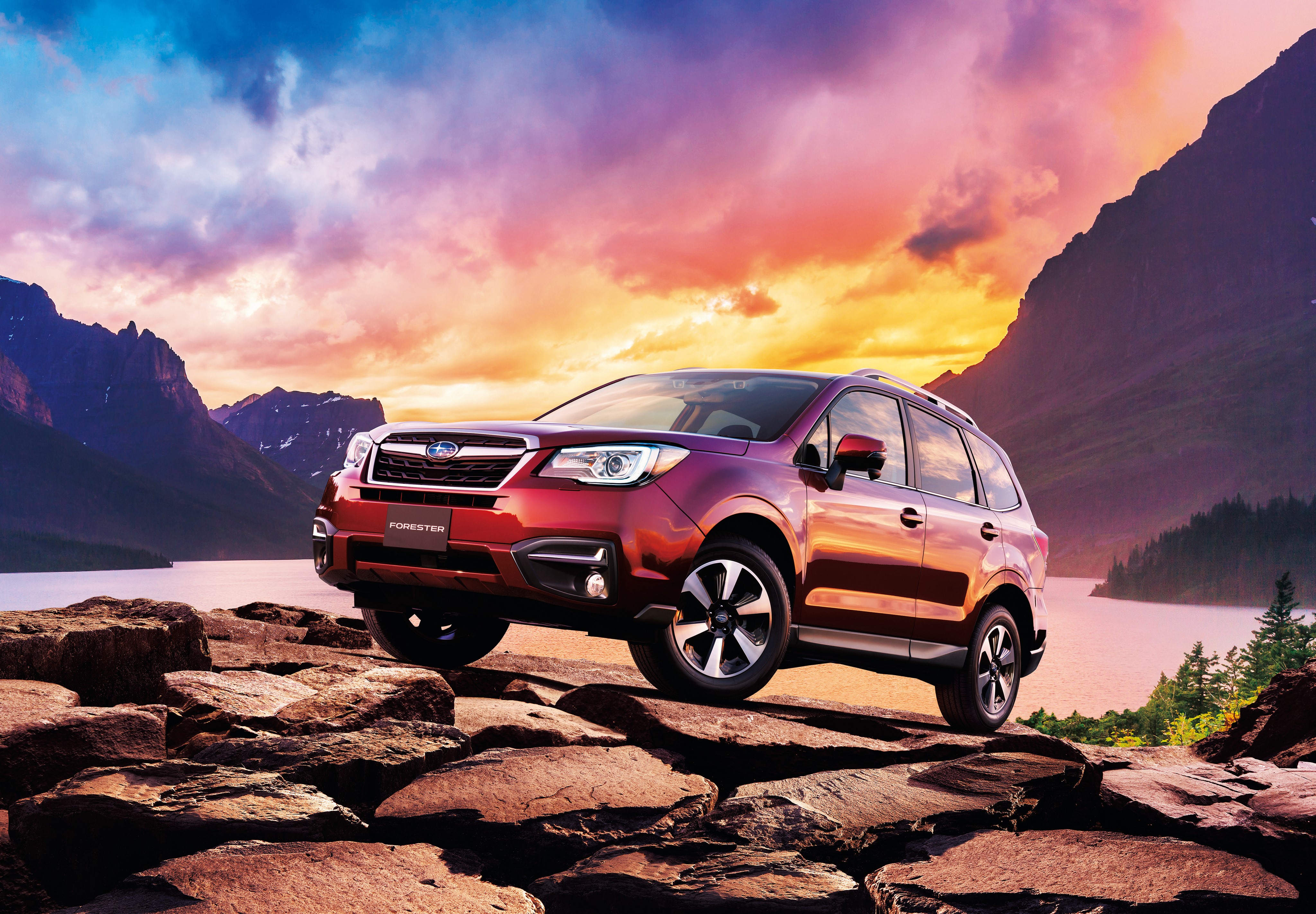 Red Subaru Forester on Rocks at Sunset HD Wallpaper