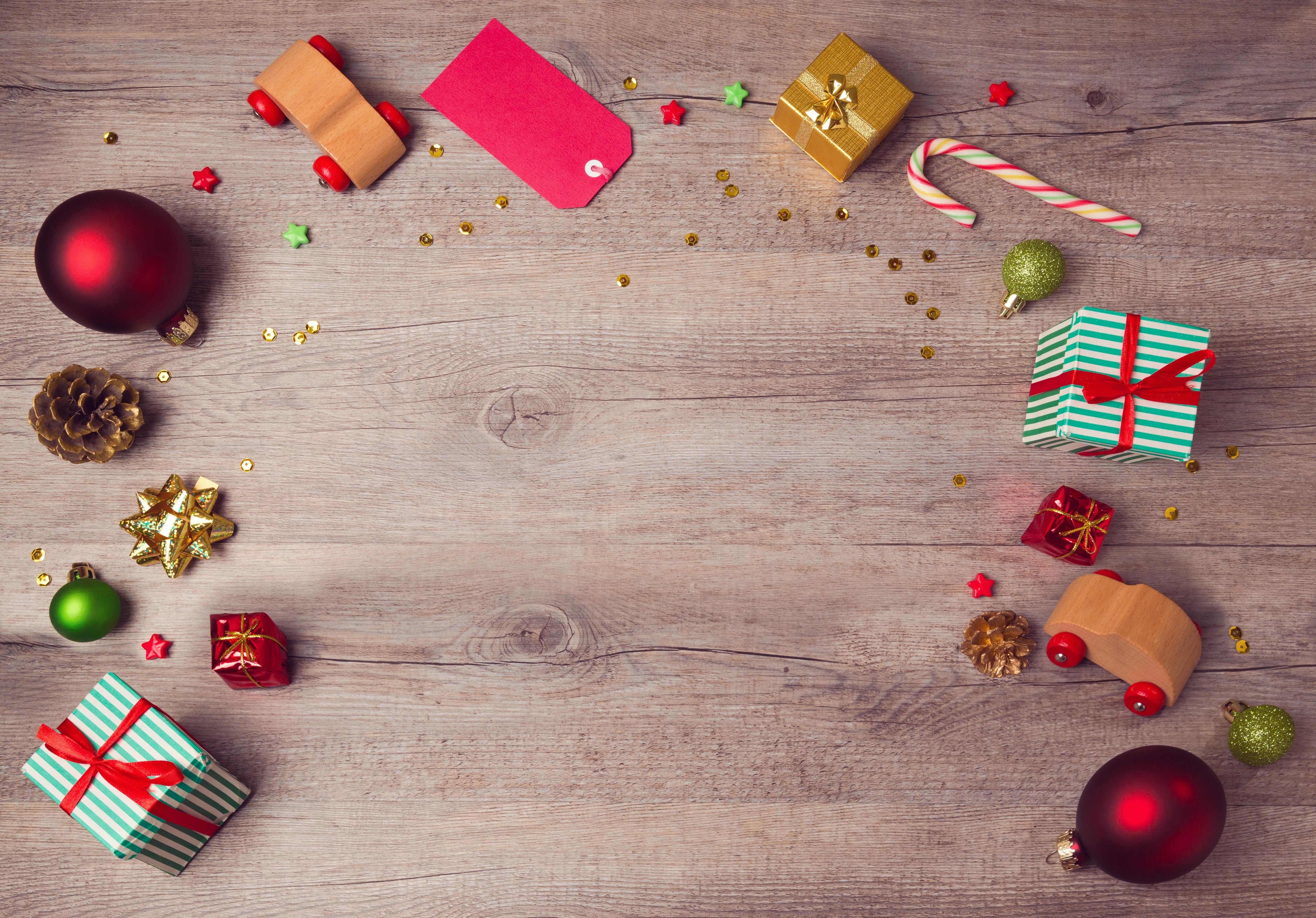 Christmas decorations and gifts on a wooden background HD Wallpaper